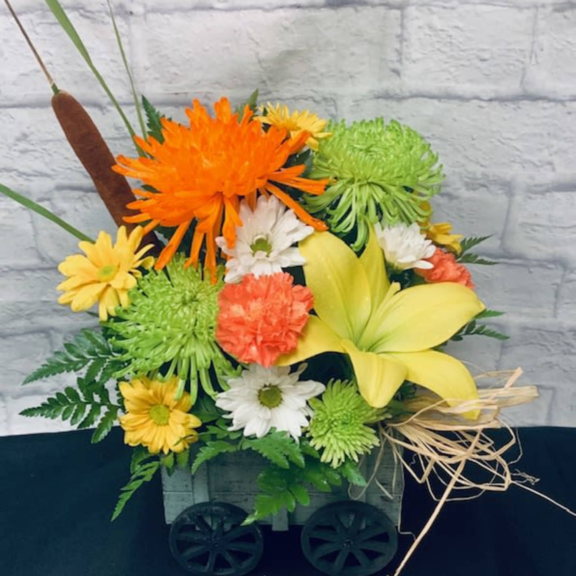 Let our designers create the perfect Fall arrangement. We just love creating, photo 3 of 3