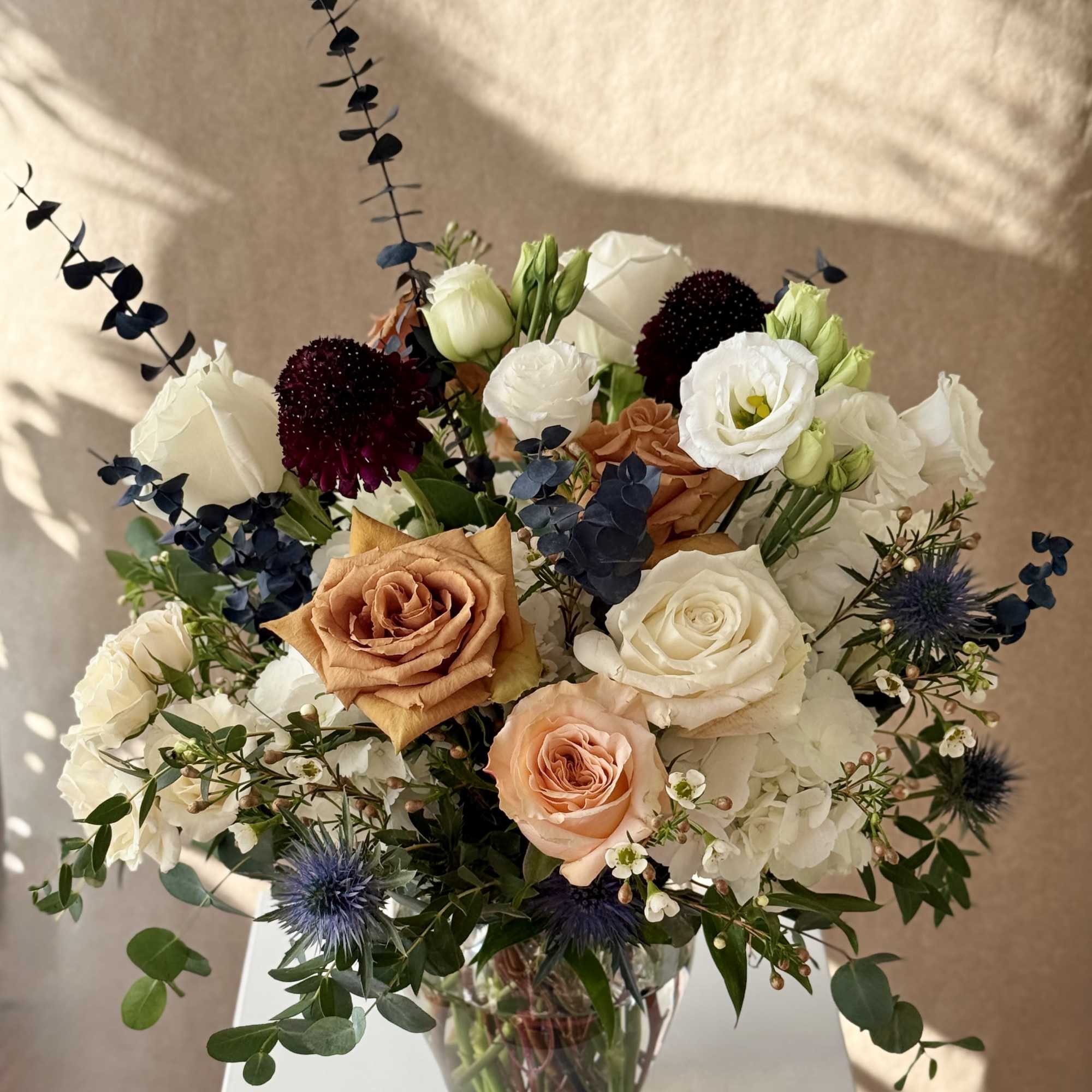 Inspired by books, in a clear glass vase.