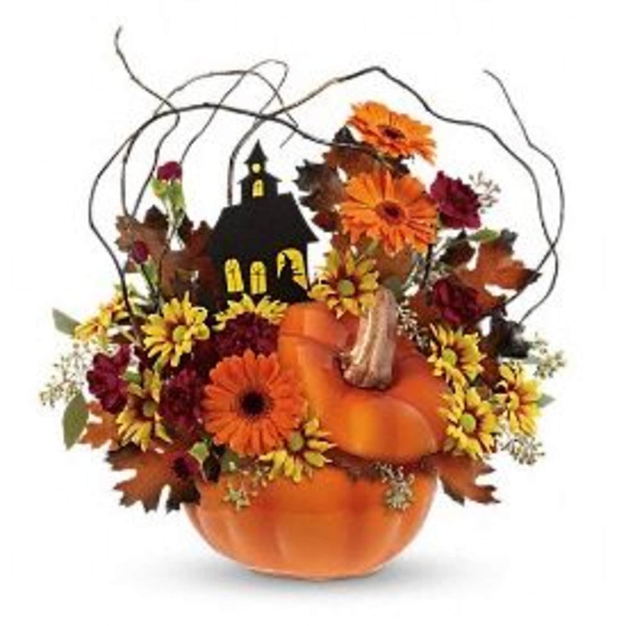 Pumpkin-shaped floral arrangement with orange and yellow flowers