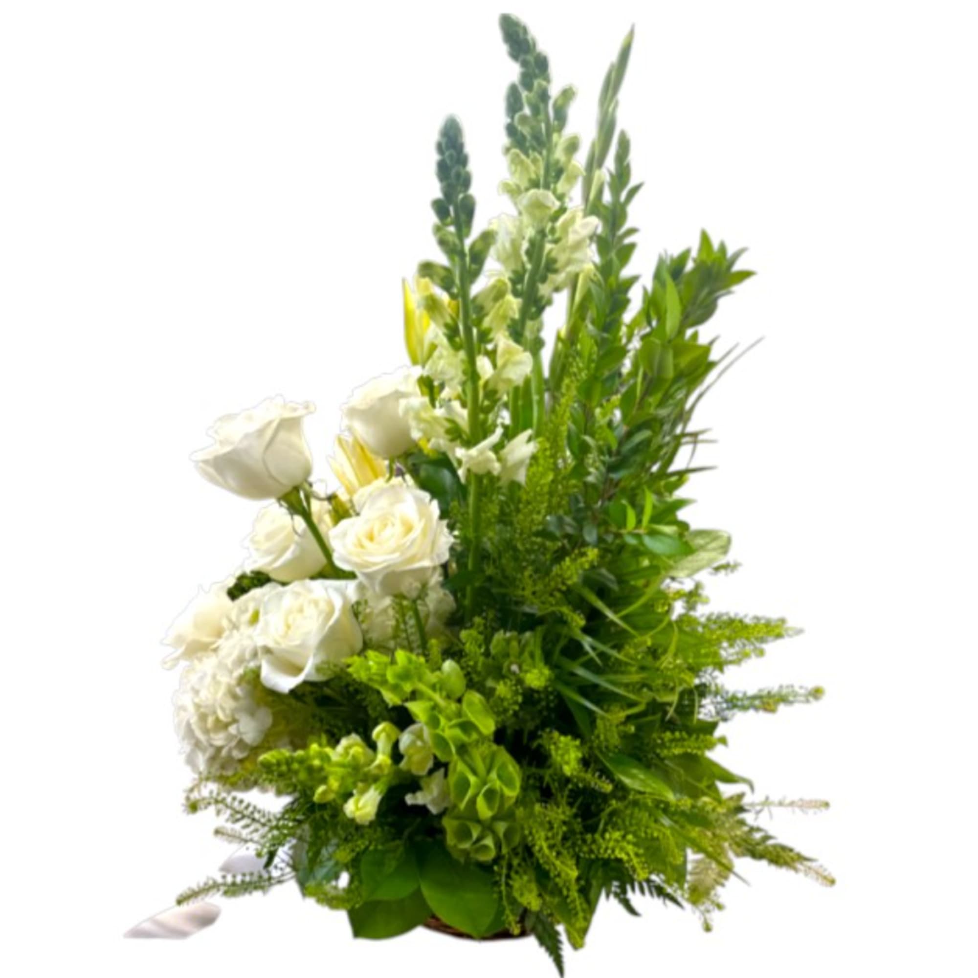 White roses and lilies in a tall green arrangement