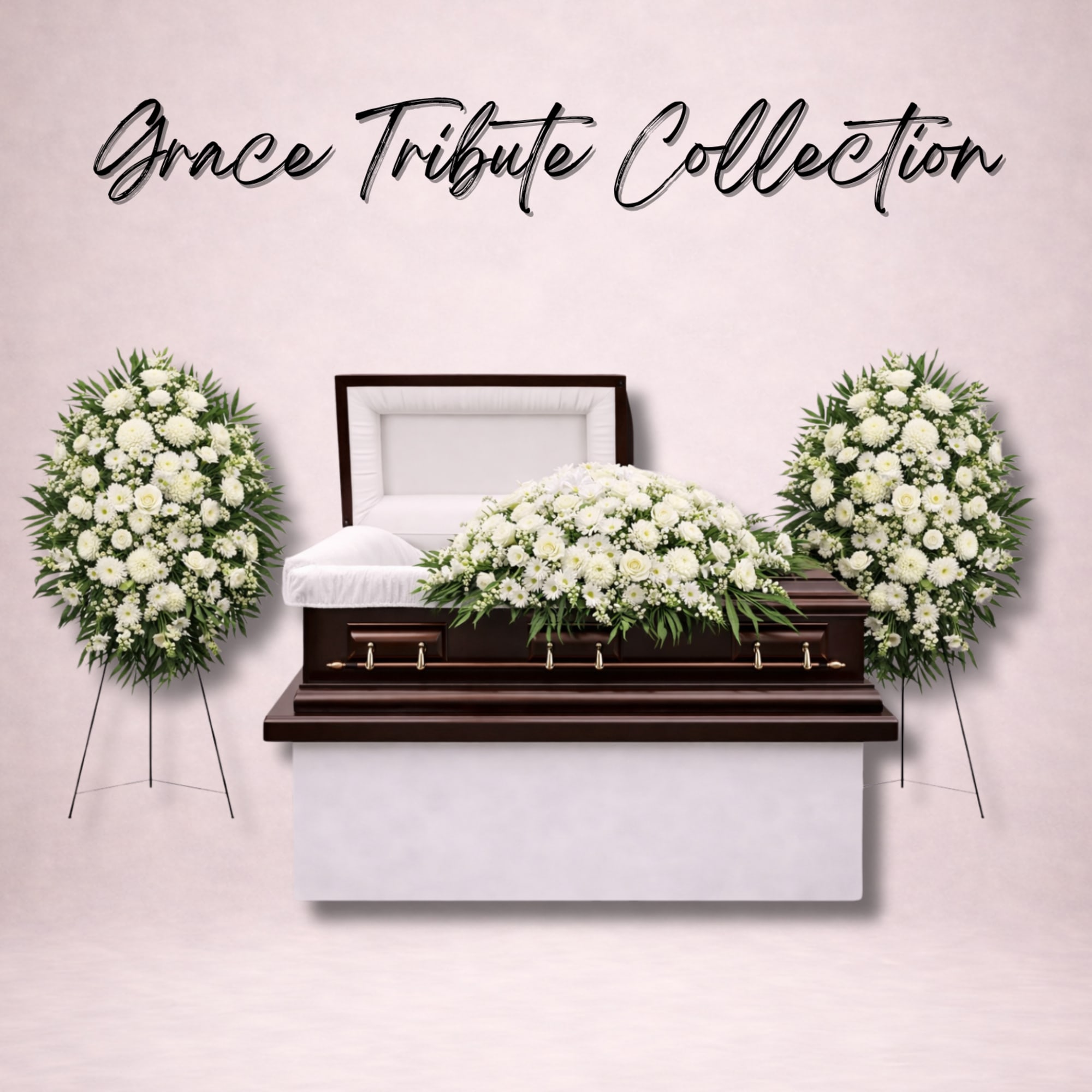 White funeral casket with white floral sprays and standing wreaths