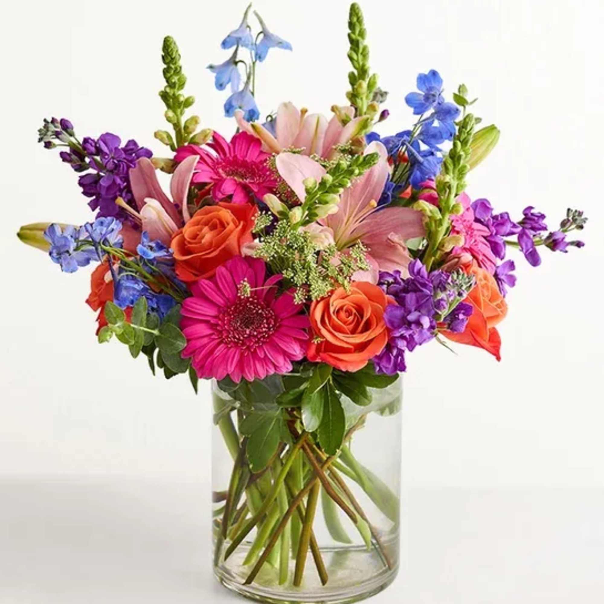 A fresh-from-the-meadow design makes this colorful bouquet a true delight. Orange roses