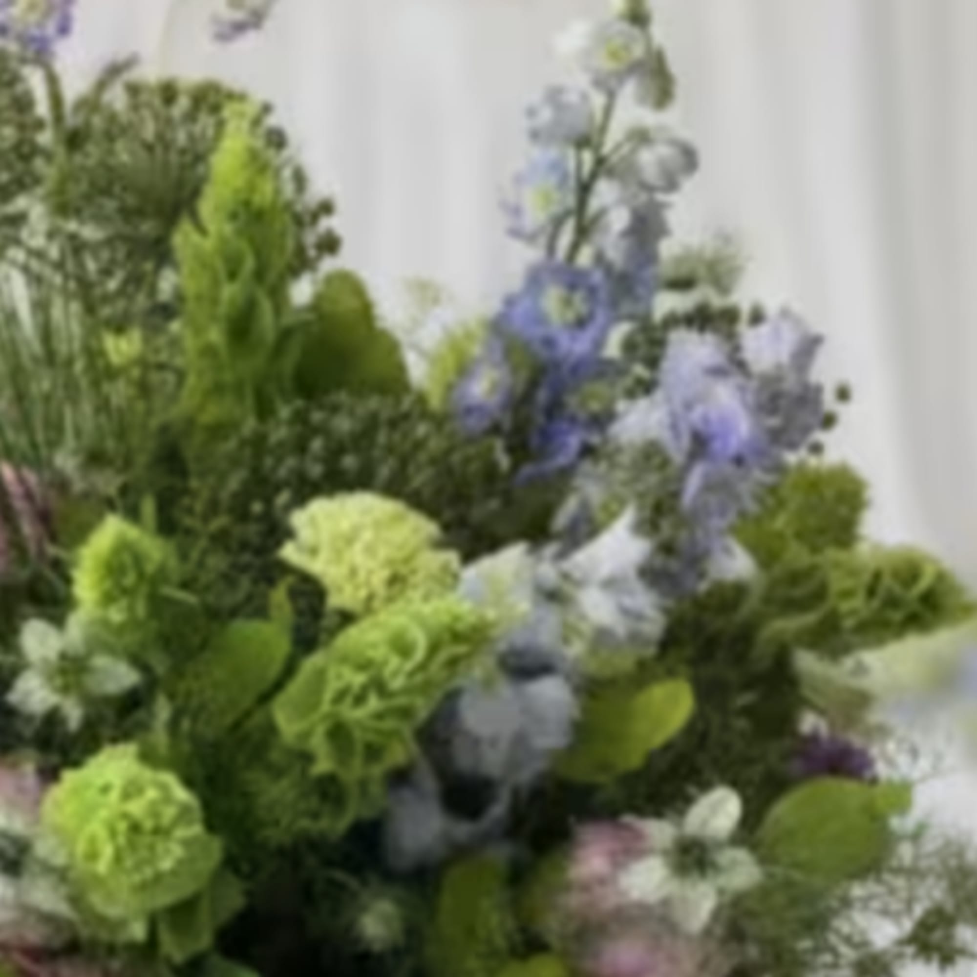 Green and lavender mixed bouquet with tall spiky blooms