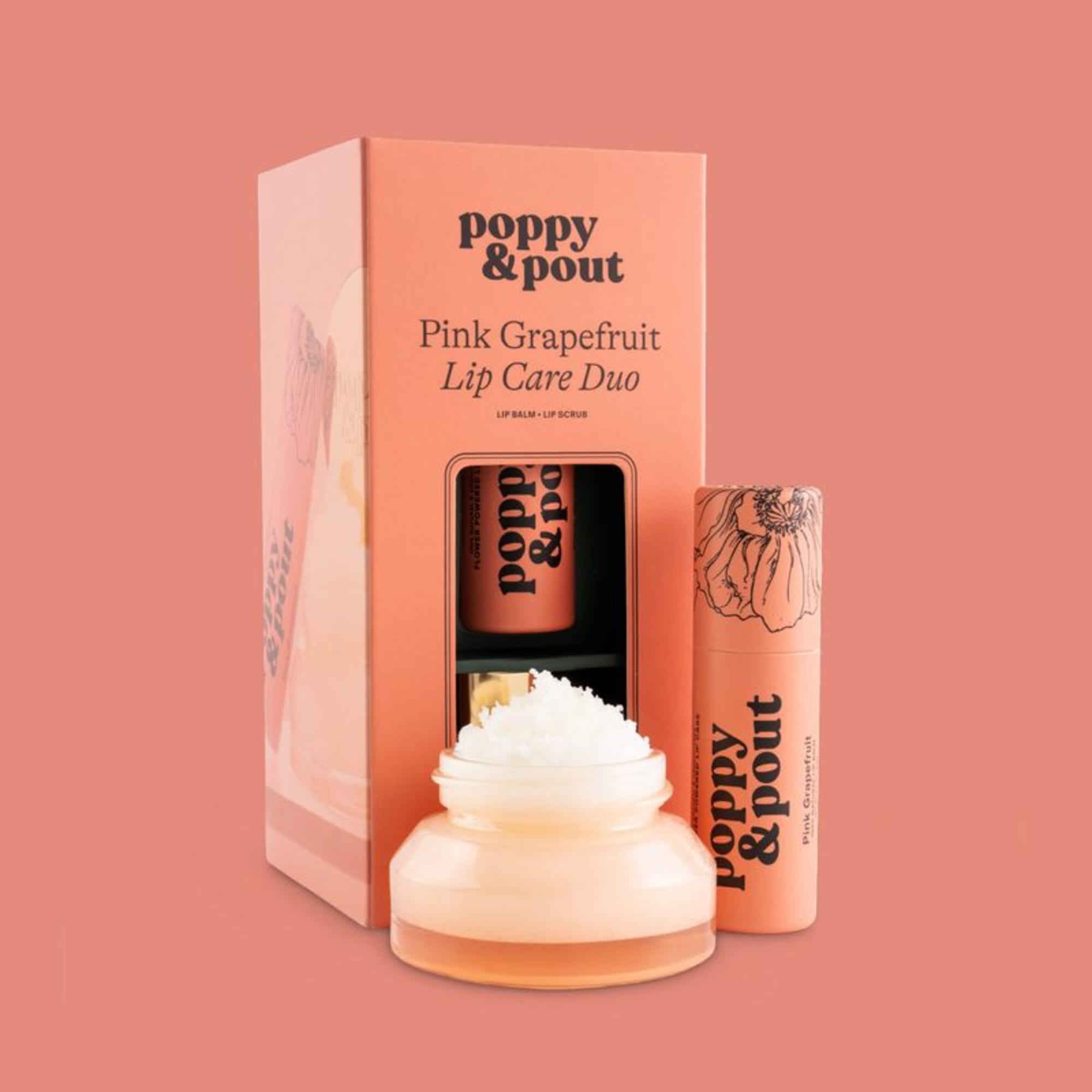Pink grapefruit lip care set with a jar, tube, and box