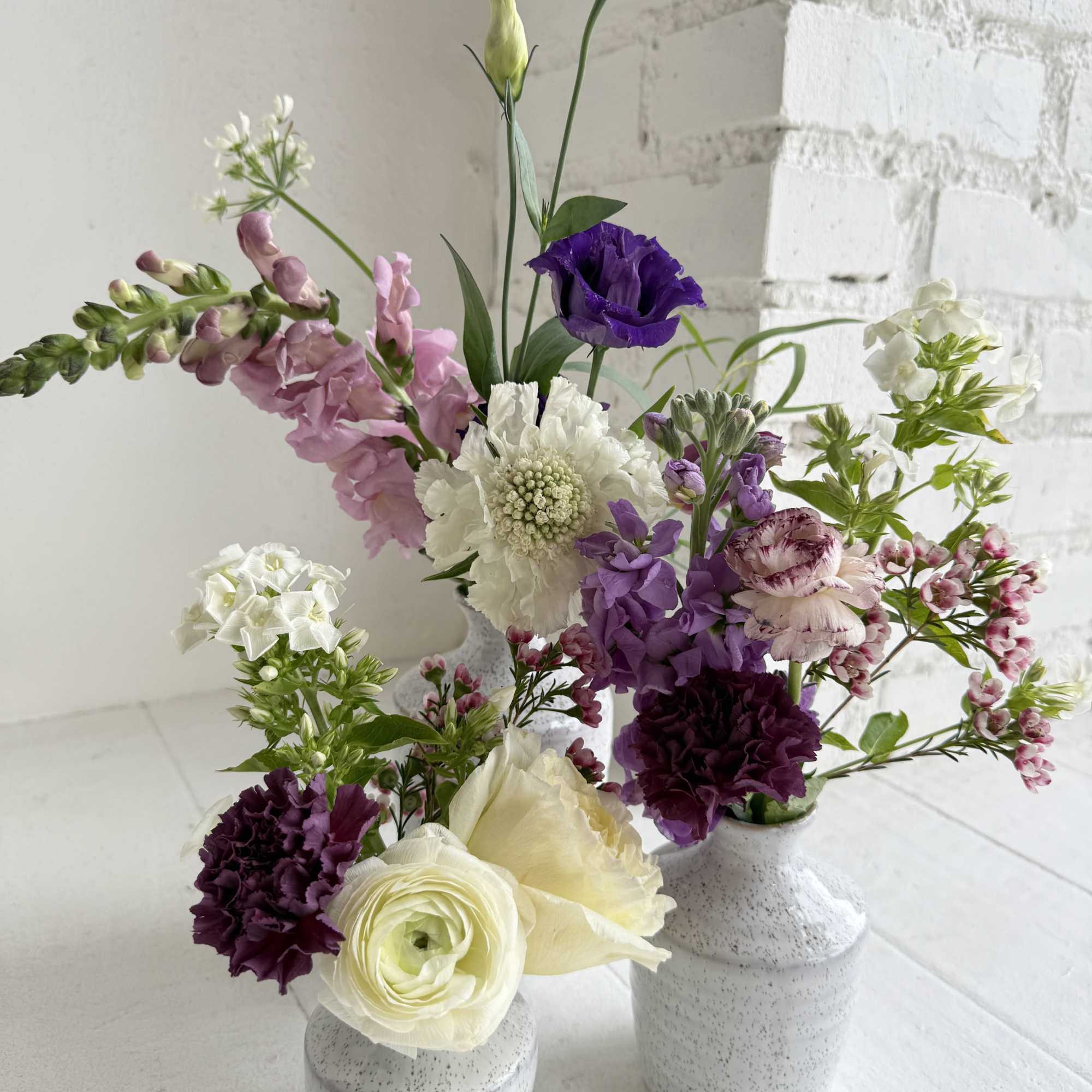 Colette is a unique arrangement. We artfully arrange our favorite seasonal flowers, photo 2 of 2