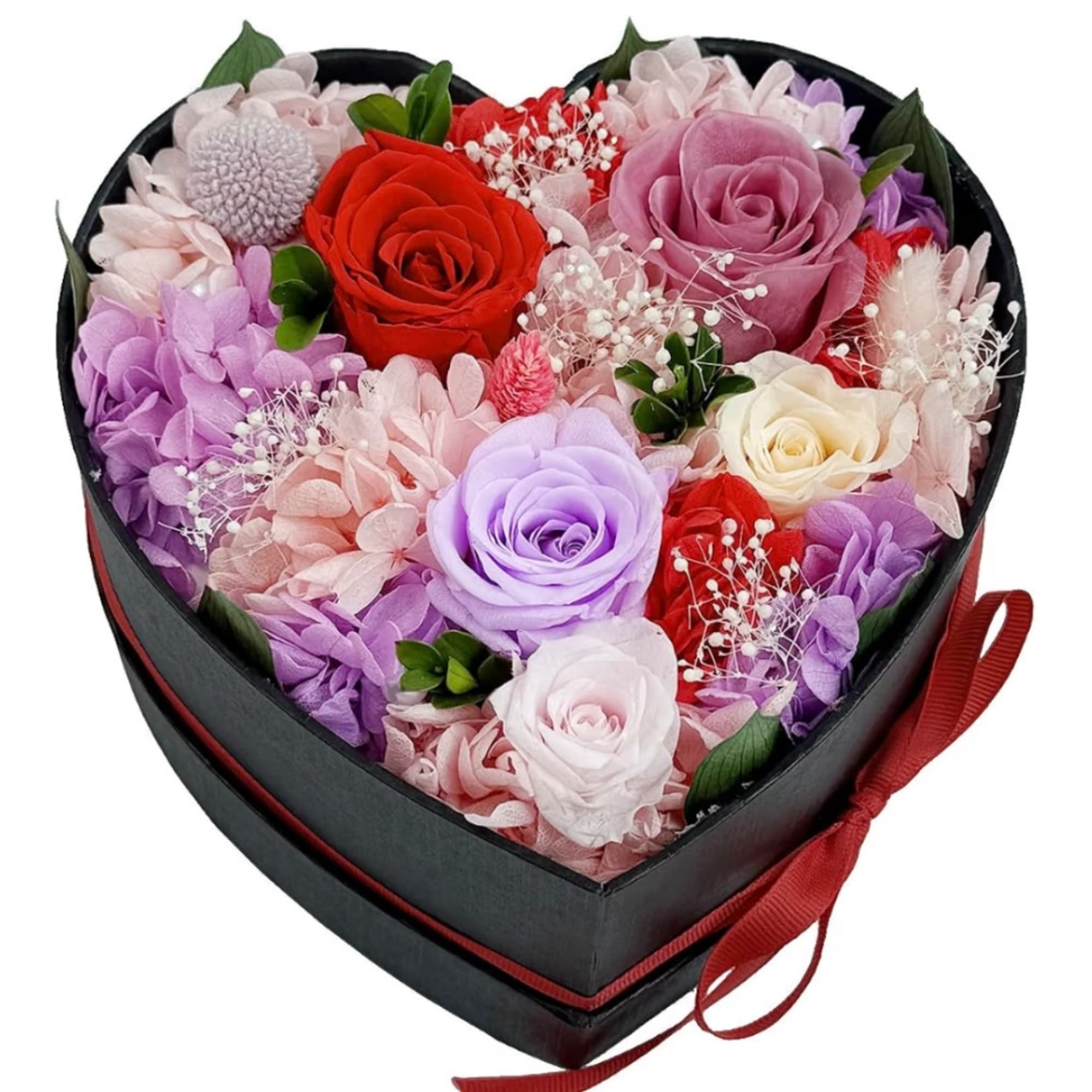Heart-shaped box of mixed roses and hydrangeas with a red ribbon