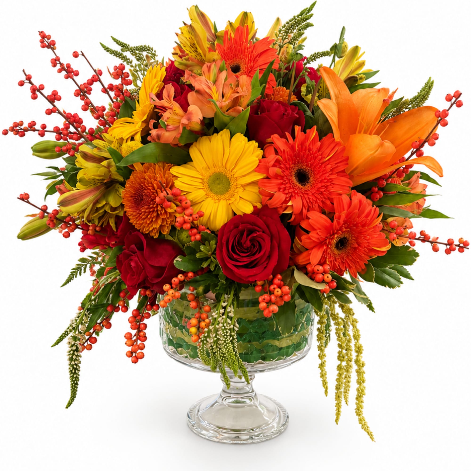 Bright mixed bouquet in a clear glass pedestal vase, photo 2 of 3