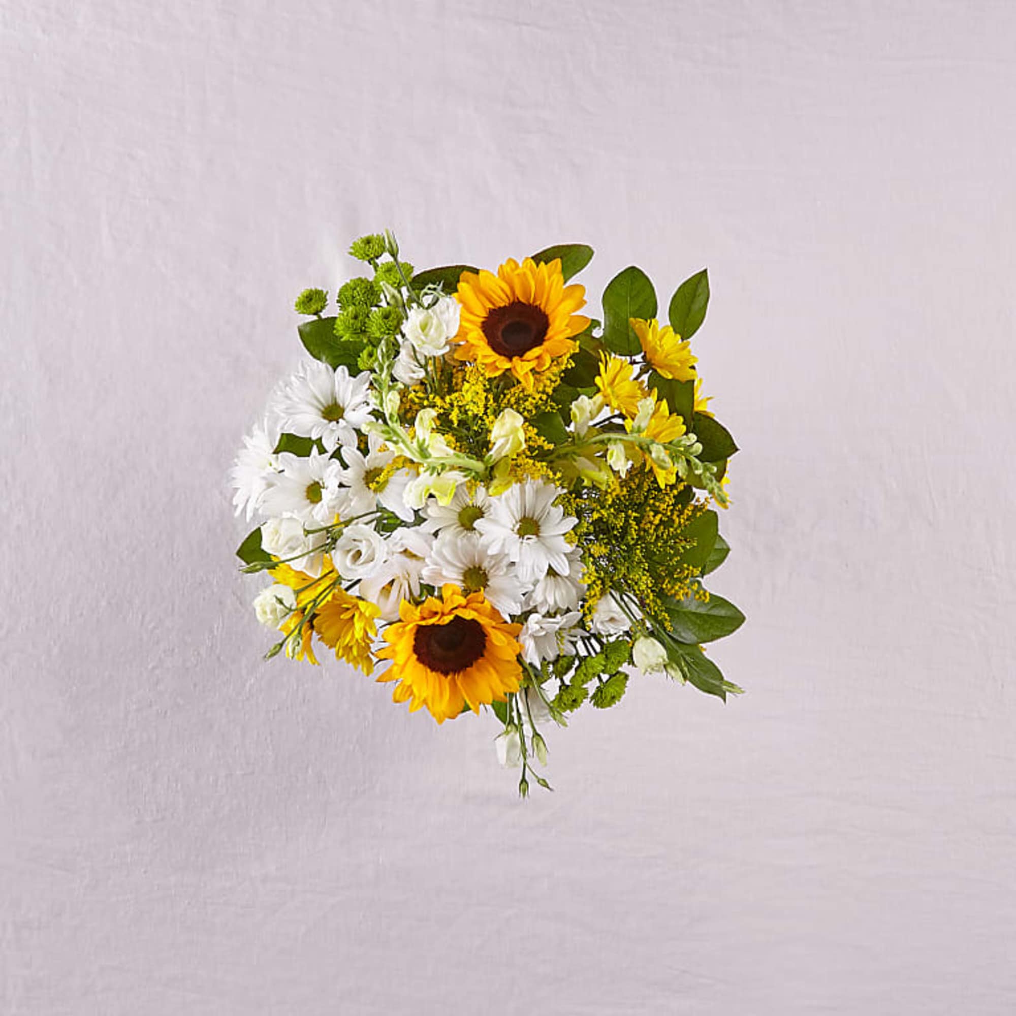 Bouquet of sunflowers, white daisies, and yellow flowers