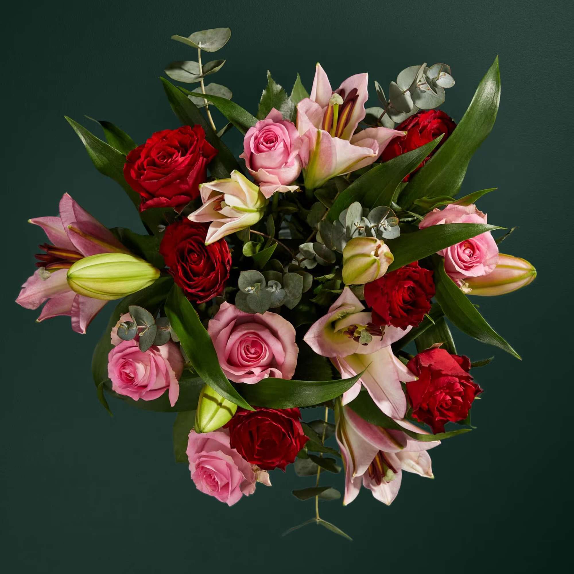 Bouquet of pink and red roses with lilies and eucalyptus, photo 2 of 3