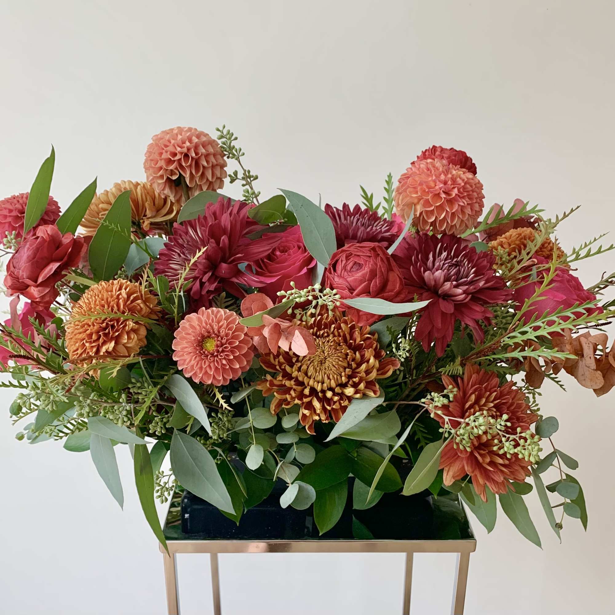 A beautiful seasonal table arrangement designed in a 10x5inch tray, with premium, photo 2 of 2