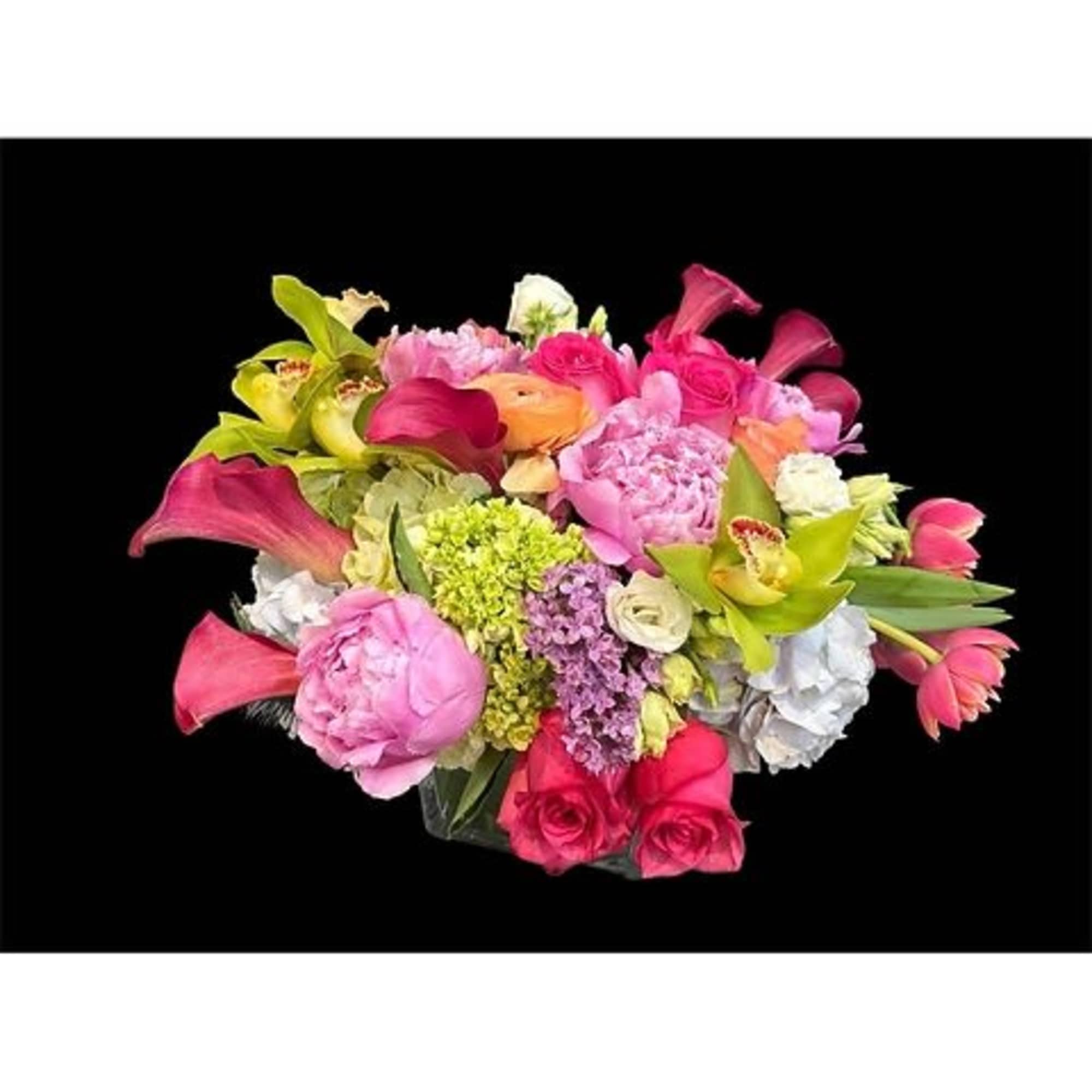 Mixed bouquet of pink, purple, and white flowers