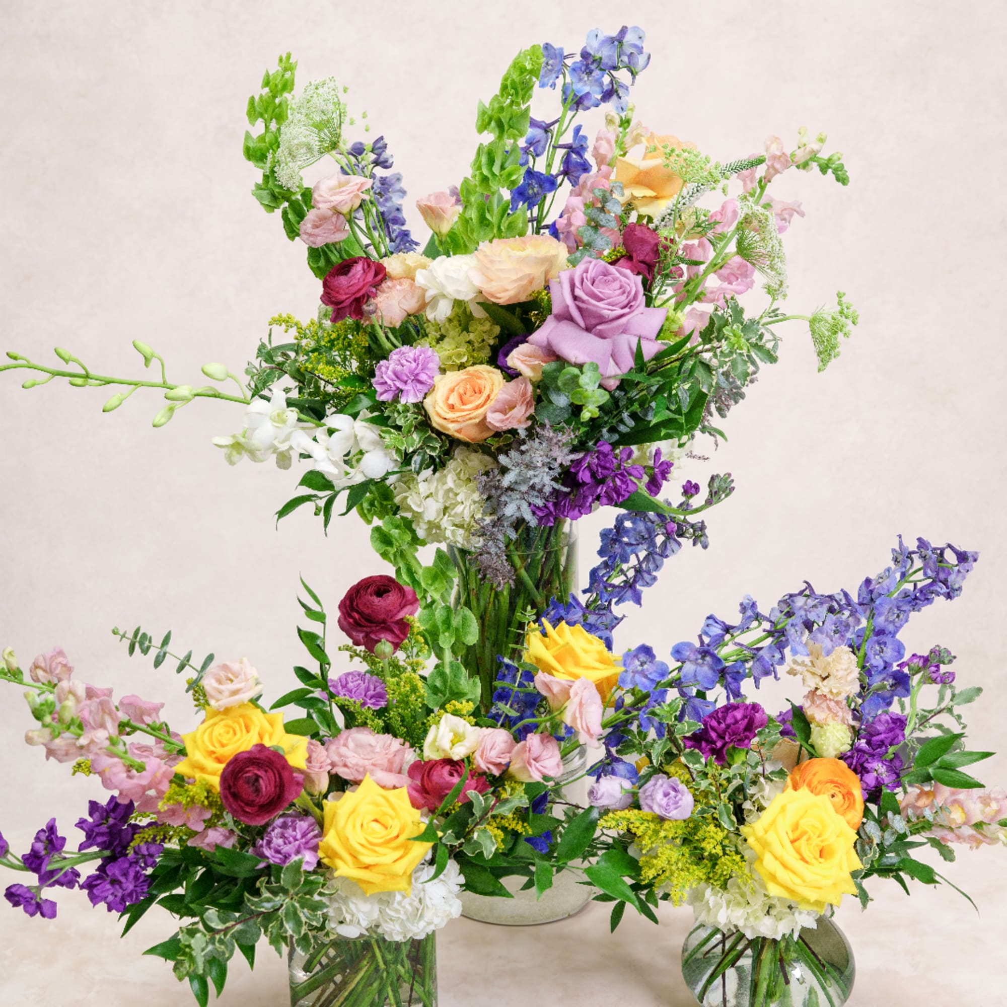 Colorful mixed flower arrangement in a glass vase