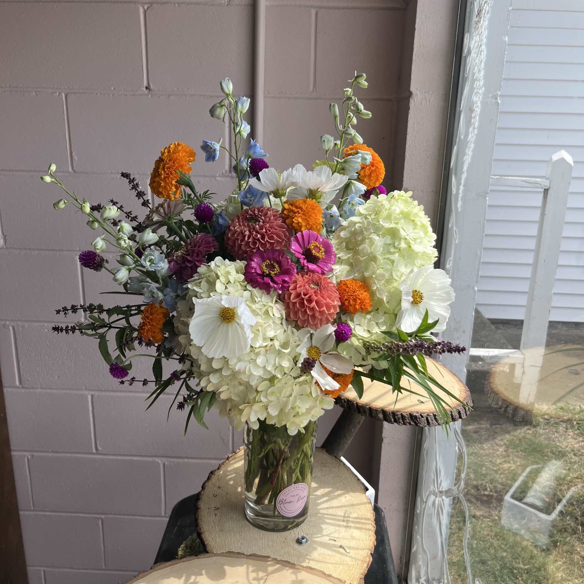 Colorful mixed bouquet in a clear glass vase