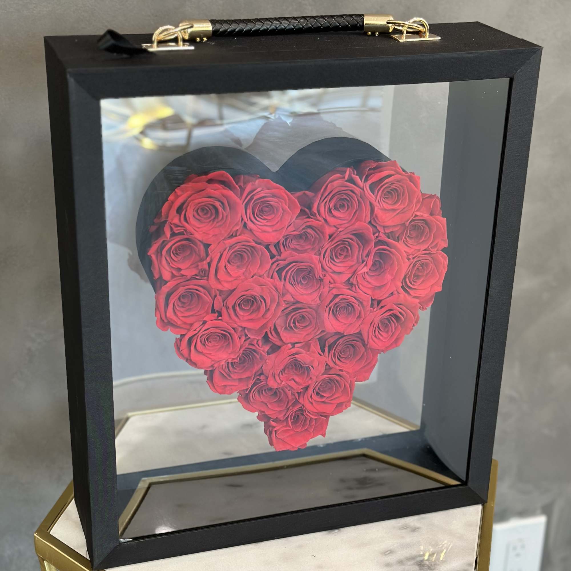 Heart-shaped box filled with red roses, photo 2 of 3