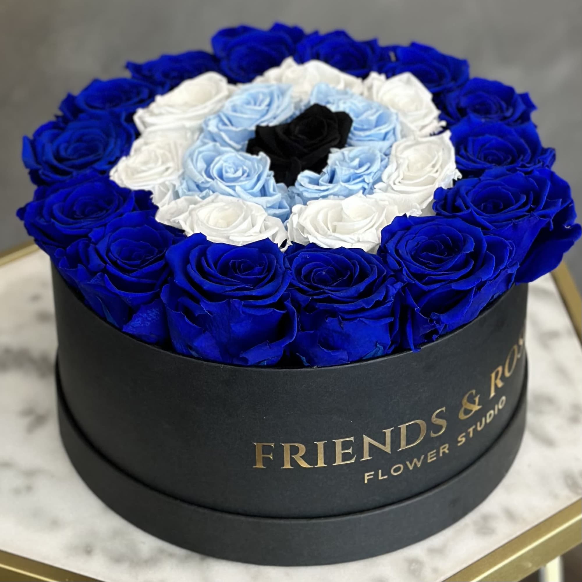 Round box of blue, white, light blue, and black roses, photo 2 of 3