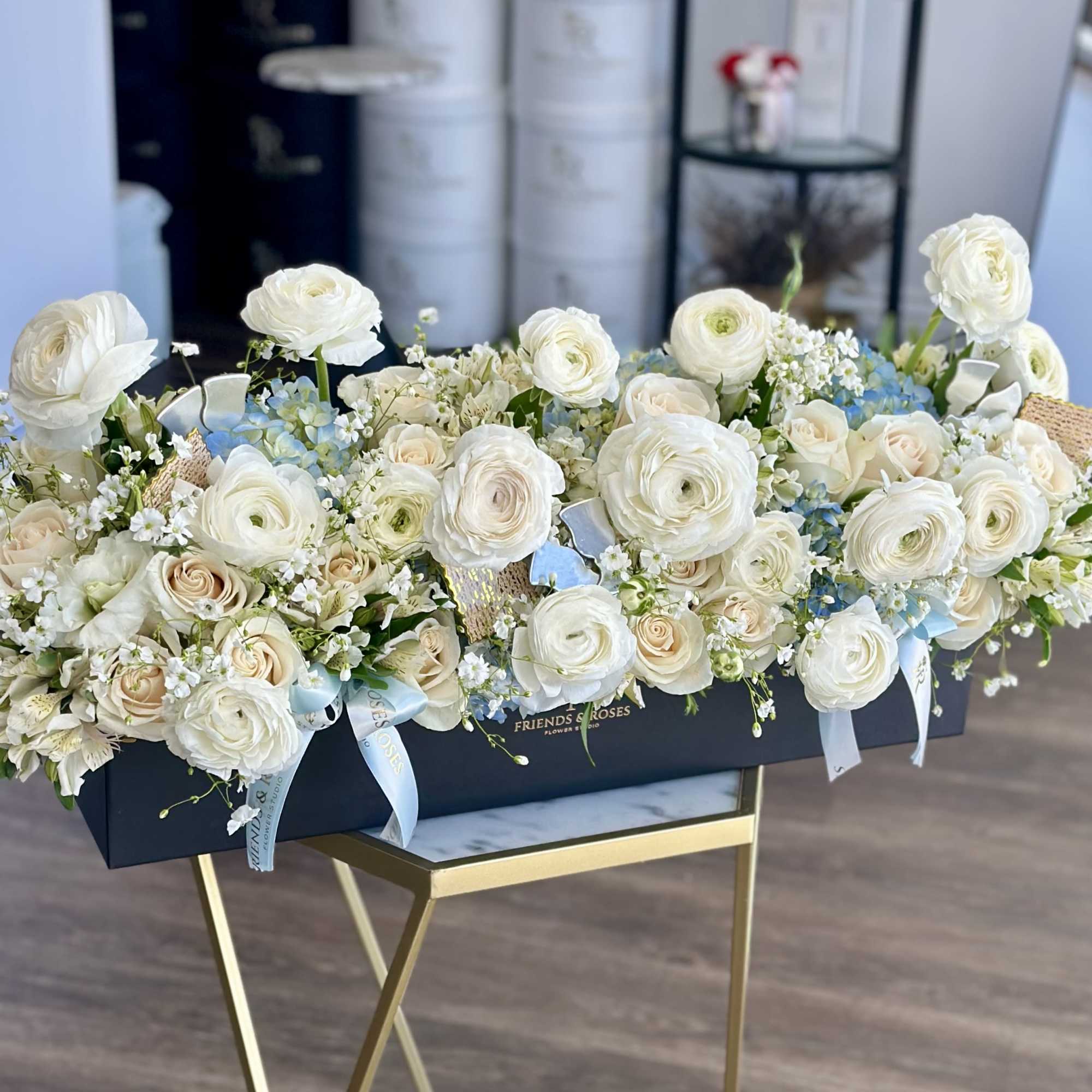 Celebrate Passover with timeless beauty and grace. This refined arrangement features soft