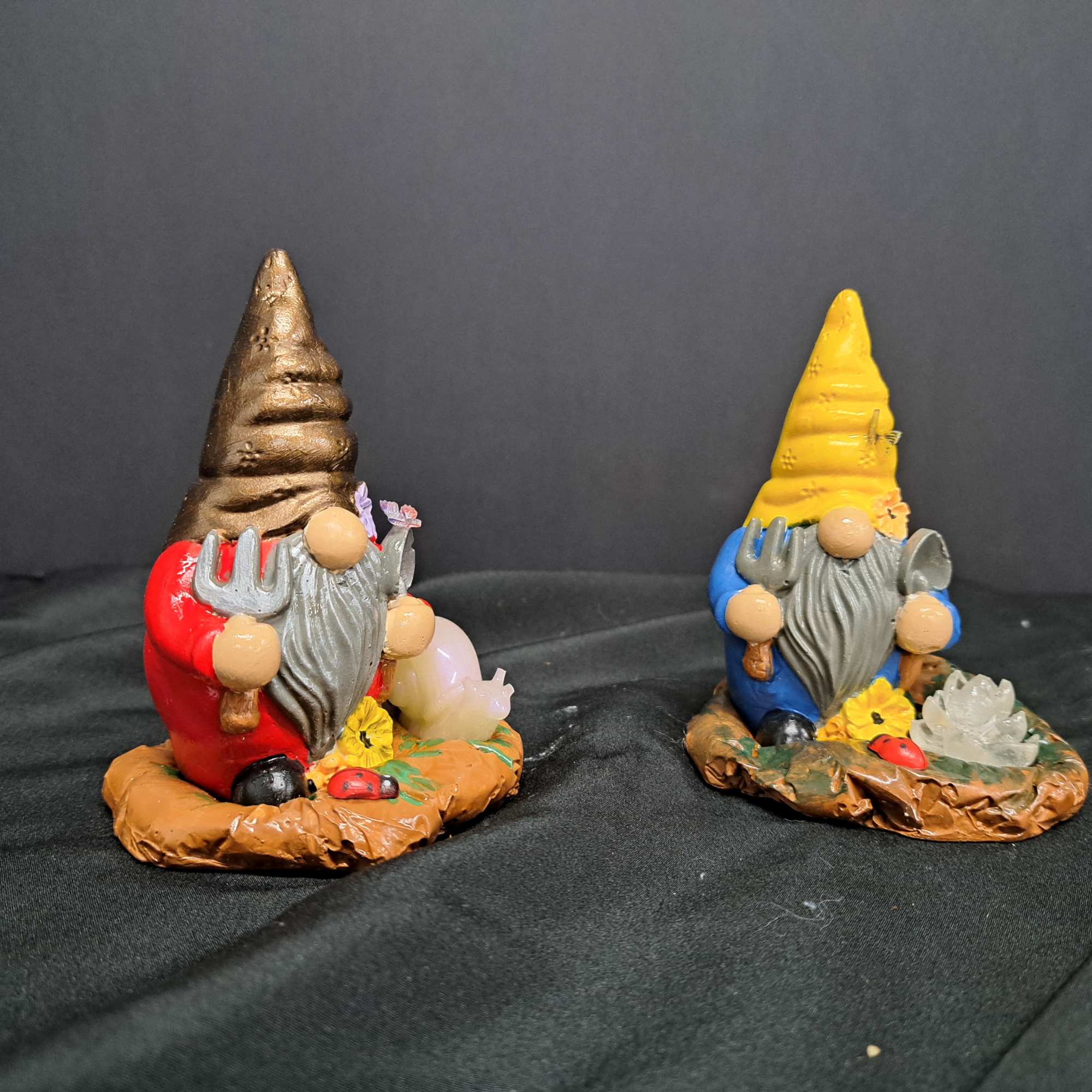 This cheerful gnome figurine bring a playful twist to a flower arrangement