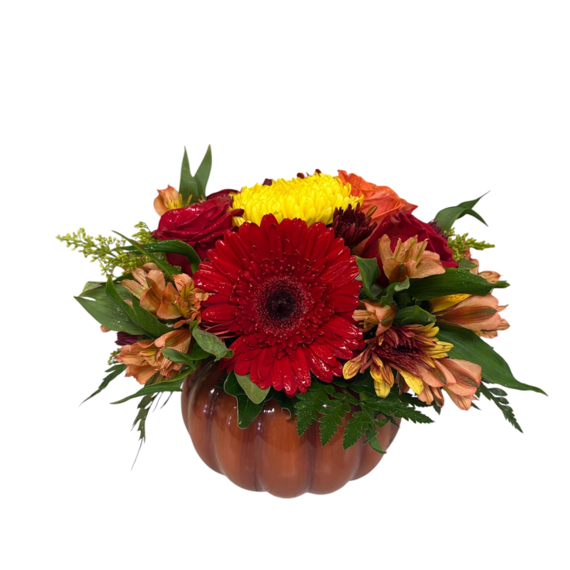 Mixed autumn flowers arranged in a pumpkin-shaped vase