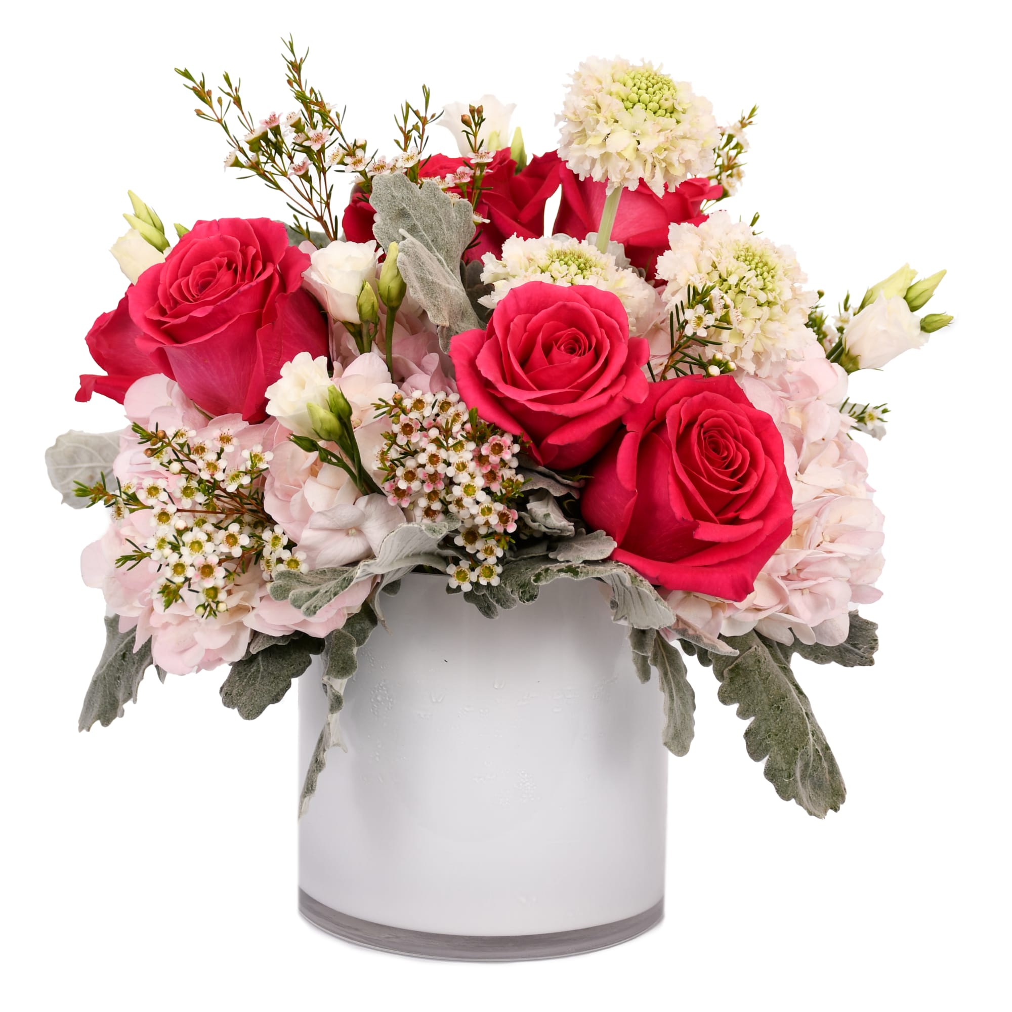Pink roses and pale hydrangeas in a white vase