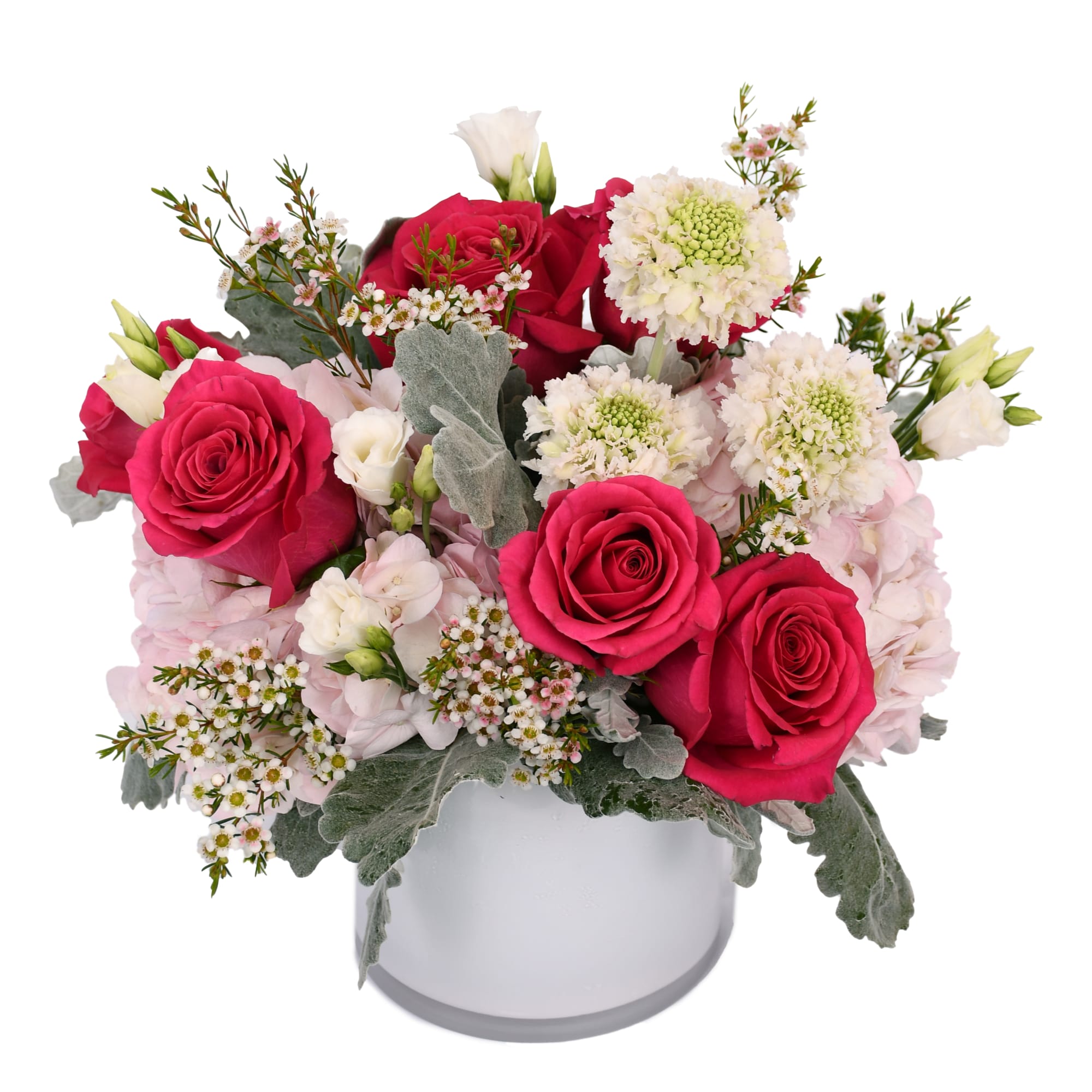 Pink and white rose arrangement in a white hatbox