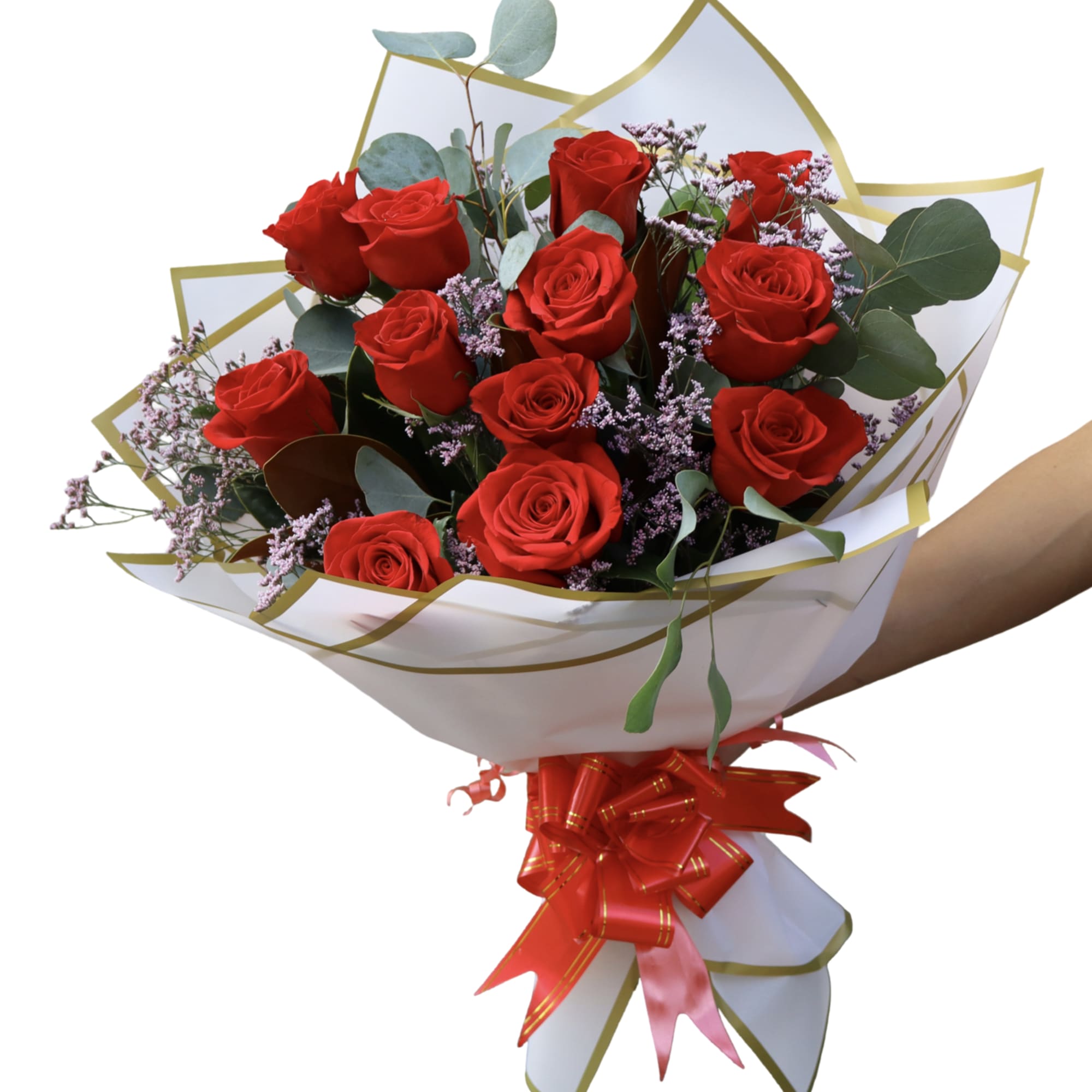 Bouquet of red roses with purple filler in white wrap