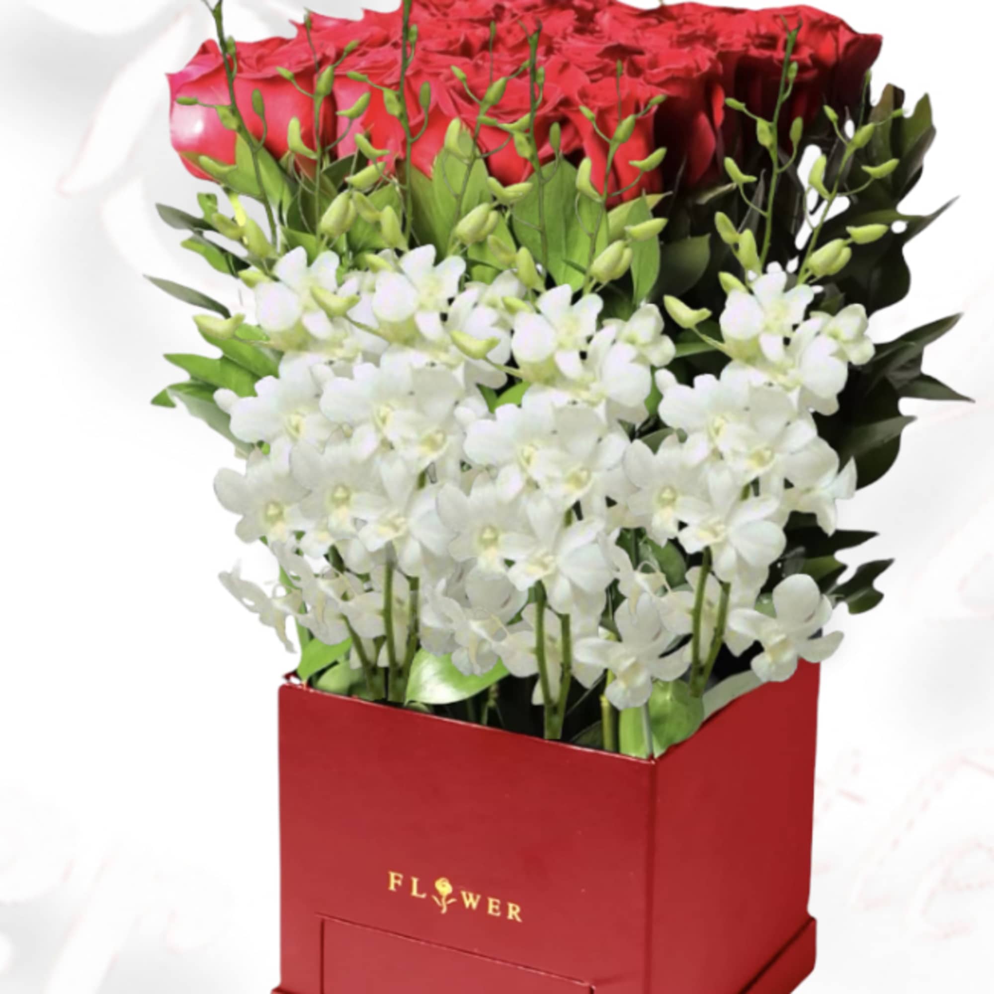 Red roses and white orchids in a red box arrangement