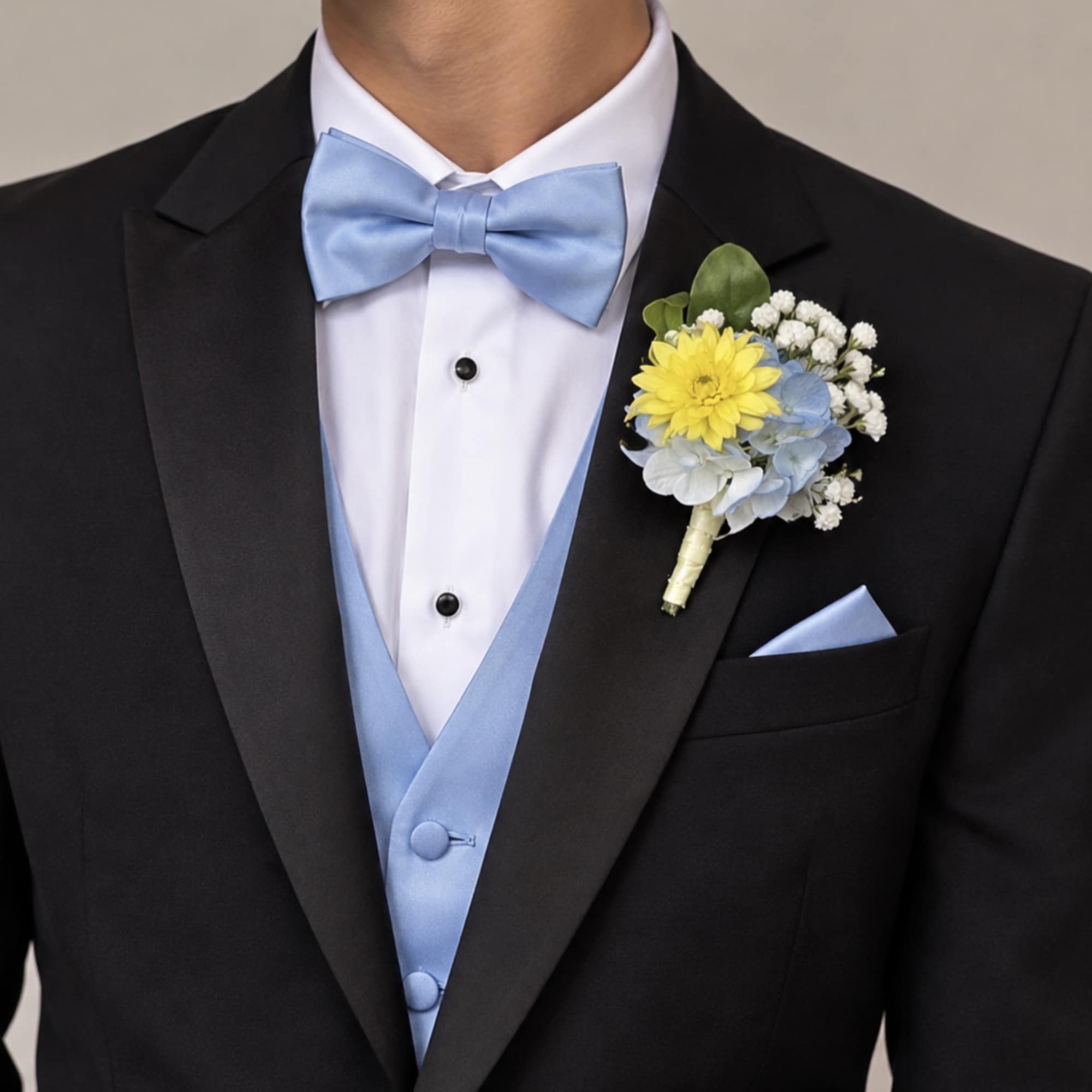 Boutonniere with yellow and blue flowers on a black tuxedo lapel