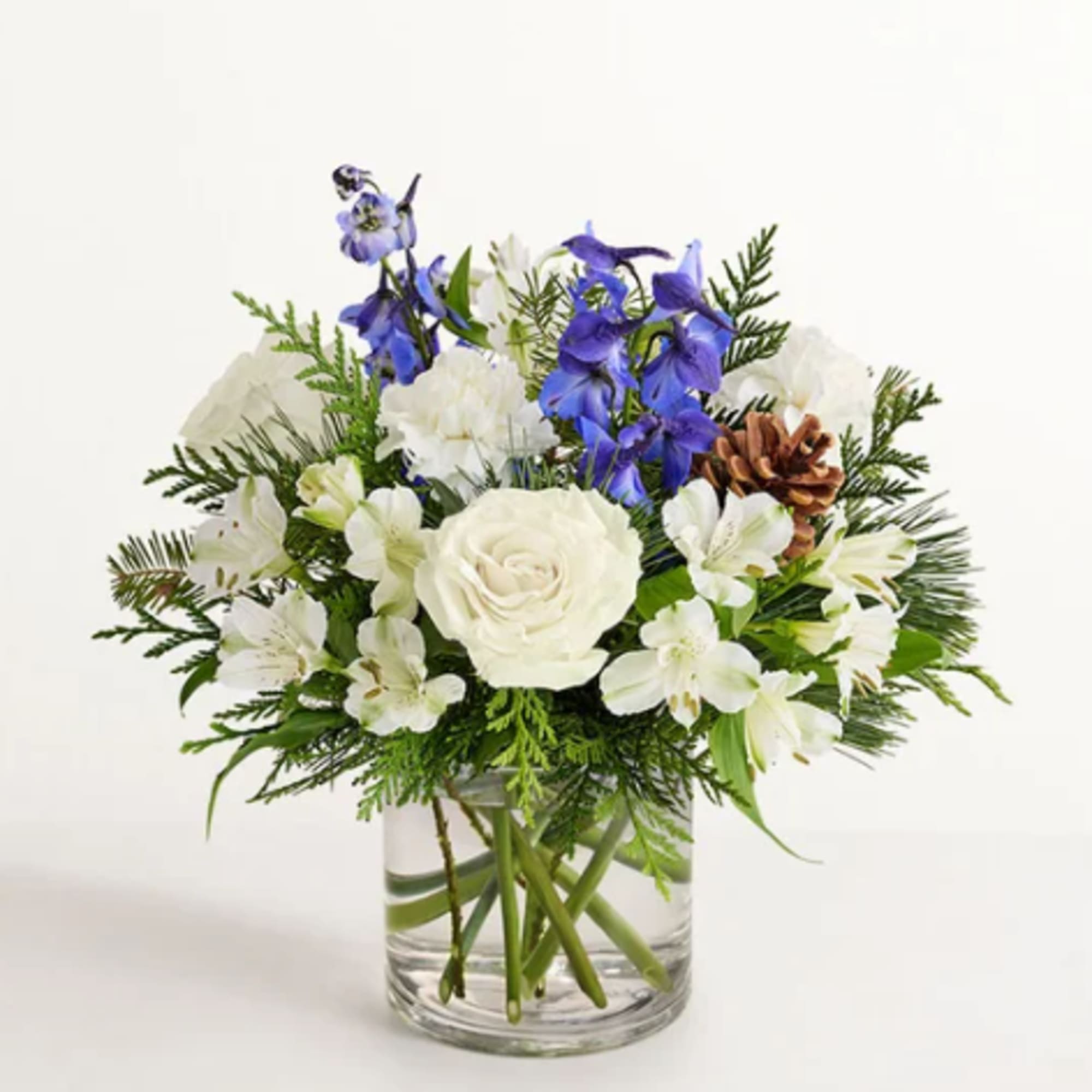 Inspired by winter&rsquo;s cool blue &amp; white landscape, our delightful arrangement delivers
