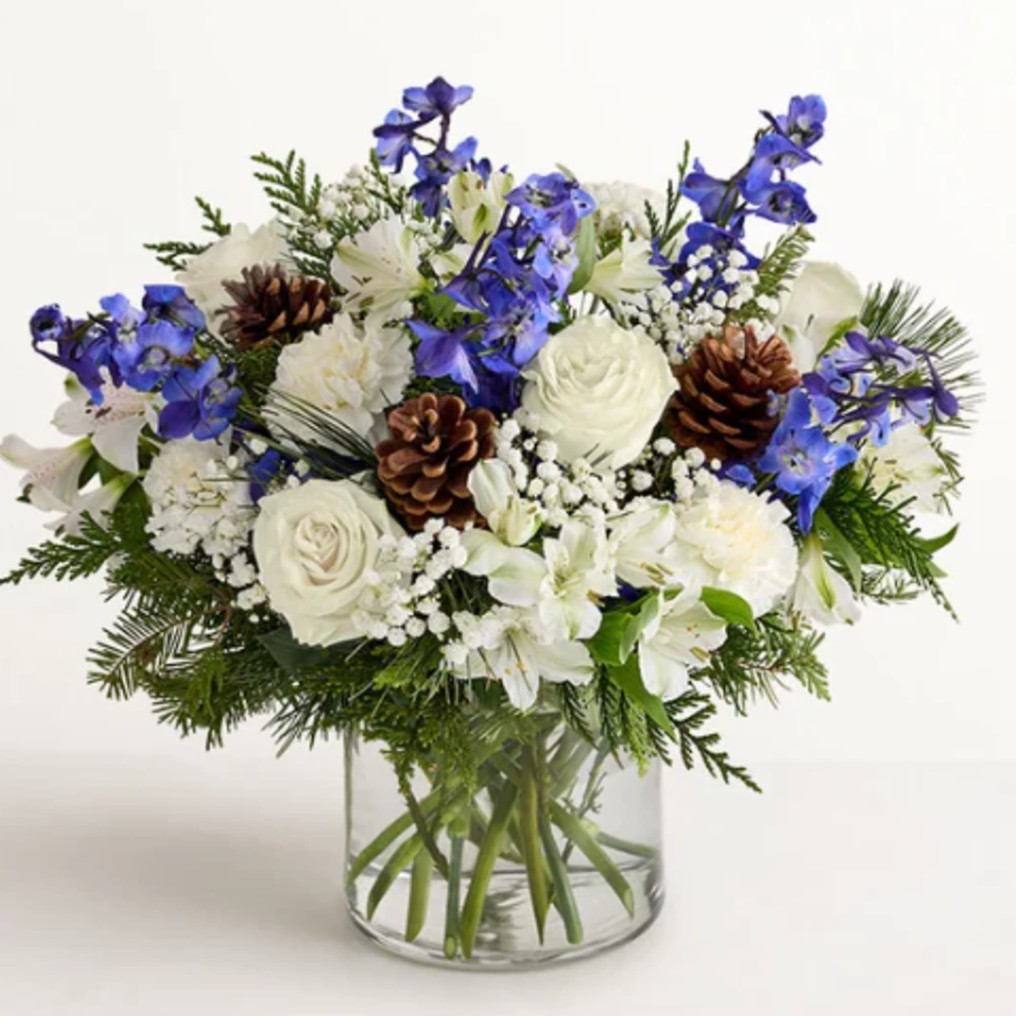 Inspired by winter&rsquo;s cool blue &amp; white landscape, our delightful arrangement delivers
