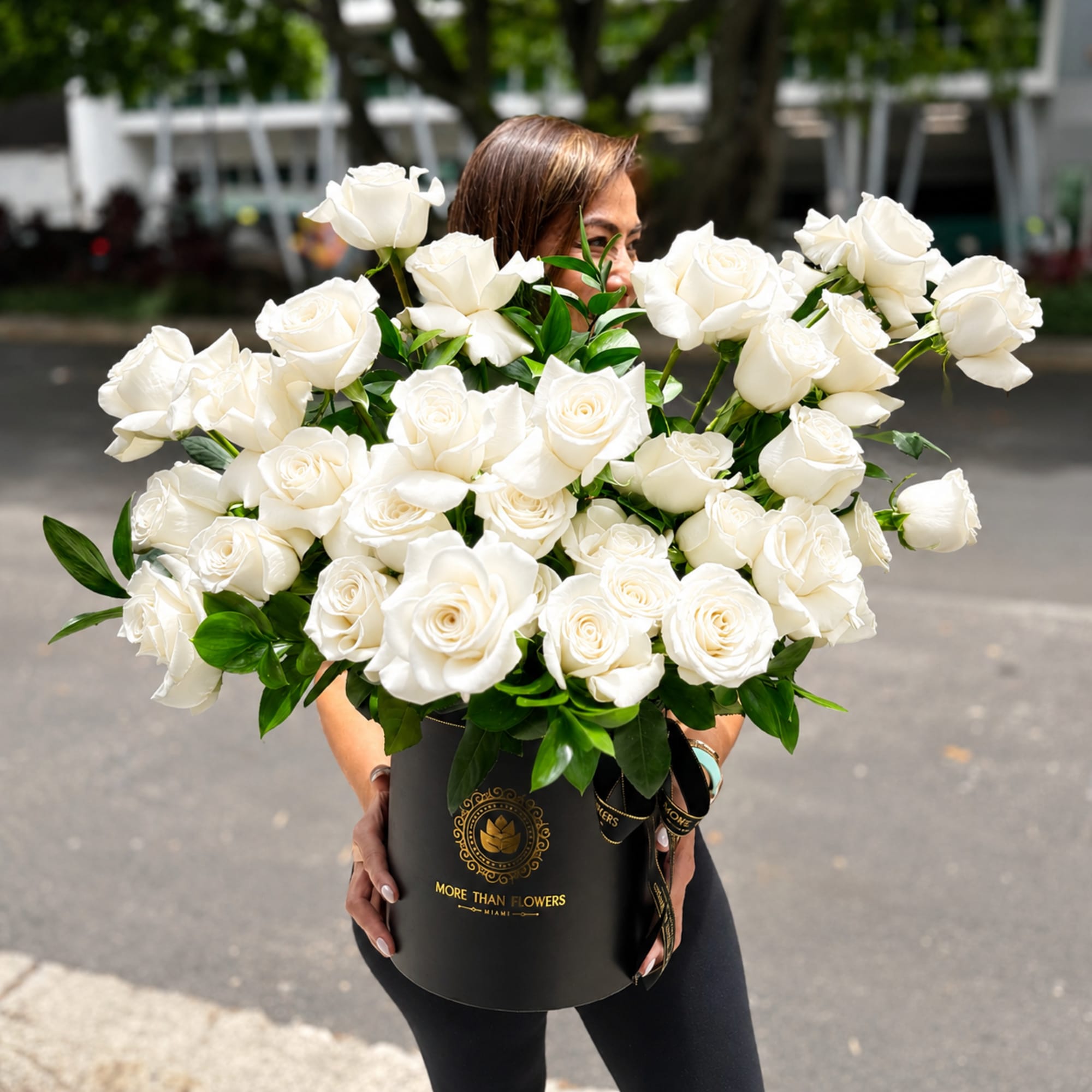 40 reflexed vivid roses cluster arranged in our signature black hatbox with