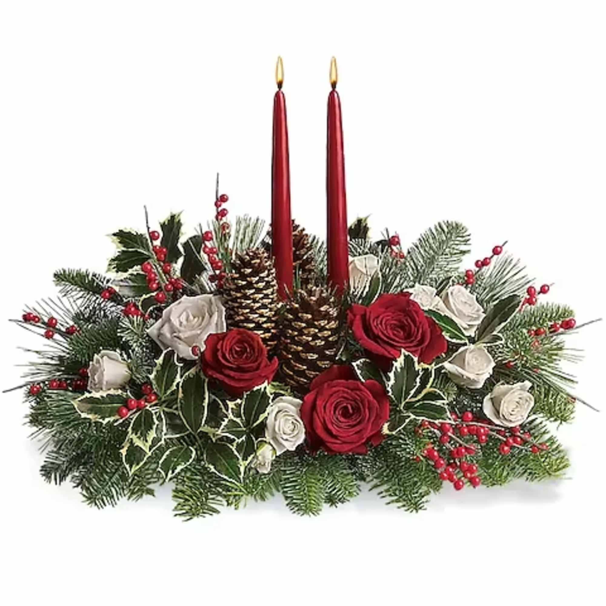 Holiday centerpiece with red candles, roses, and pinecones