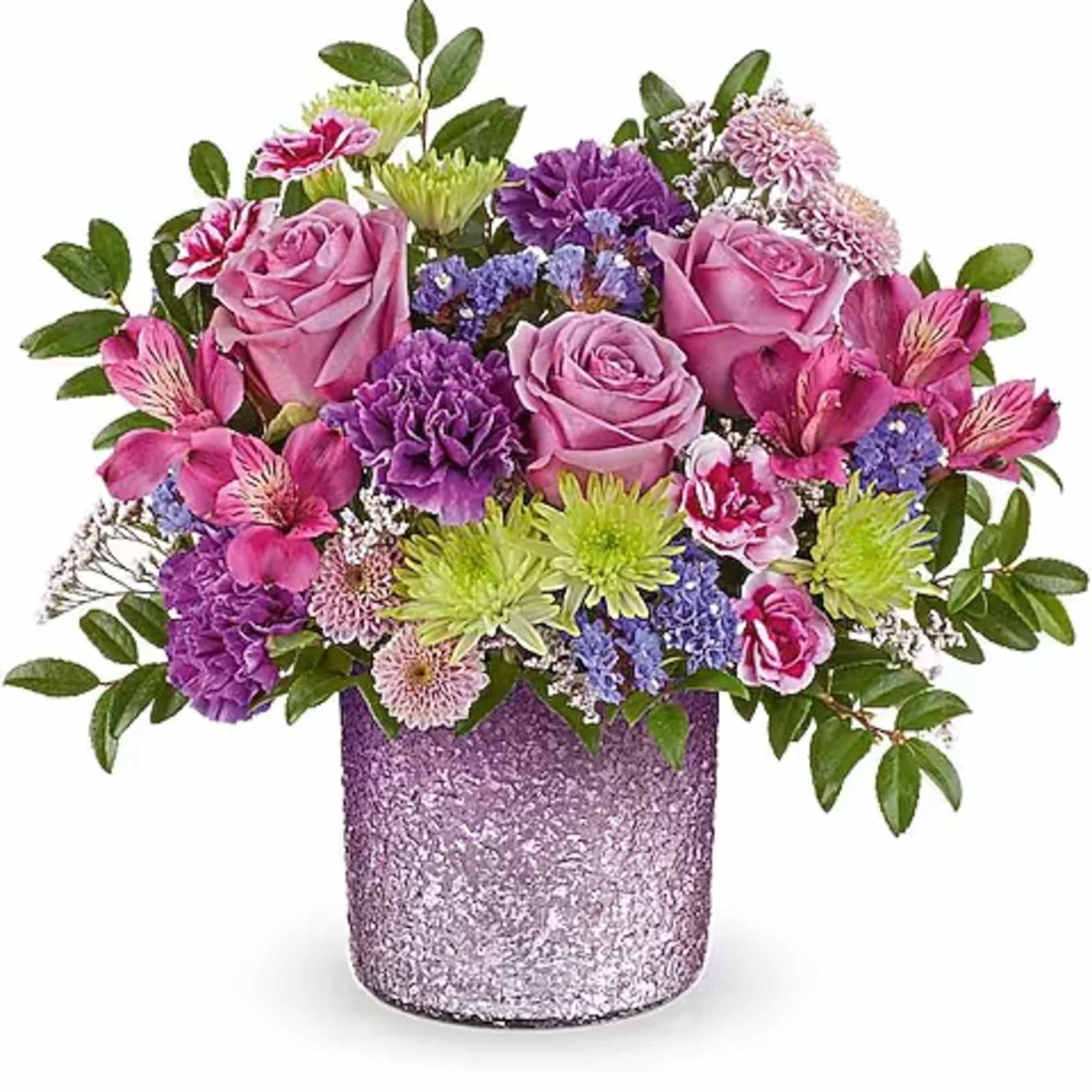 Pink and purple mixed flower arrangement in a glittery lavender vase