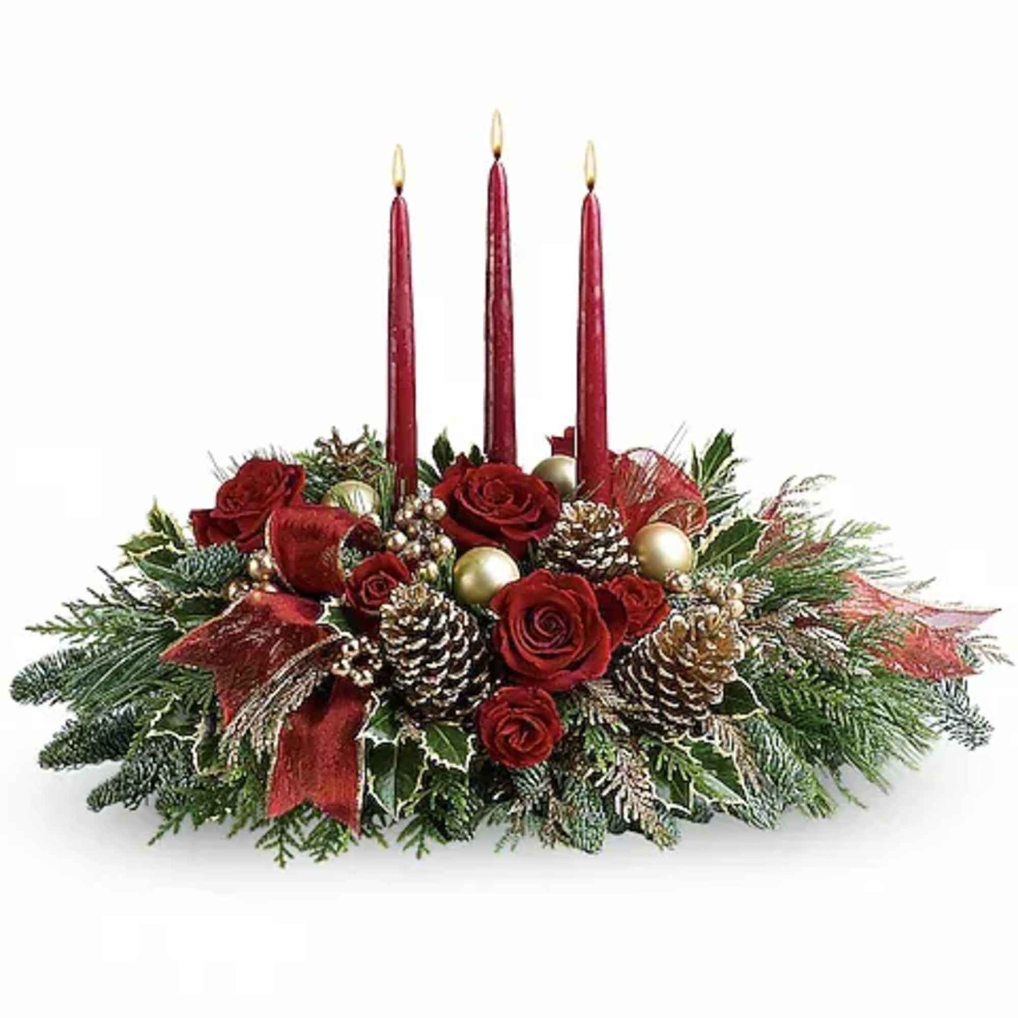 Holiday centerpiece with red roses, pinecones, and three red candles