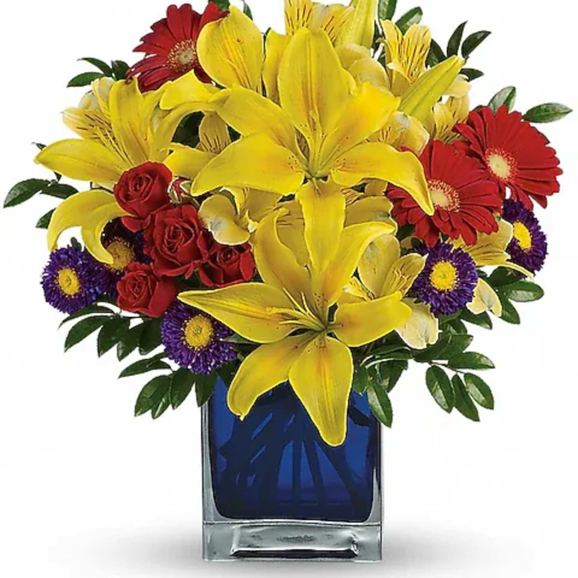 Bouquet of yellow lilies, red roses, and purple daisies in a blue glass vase