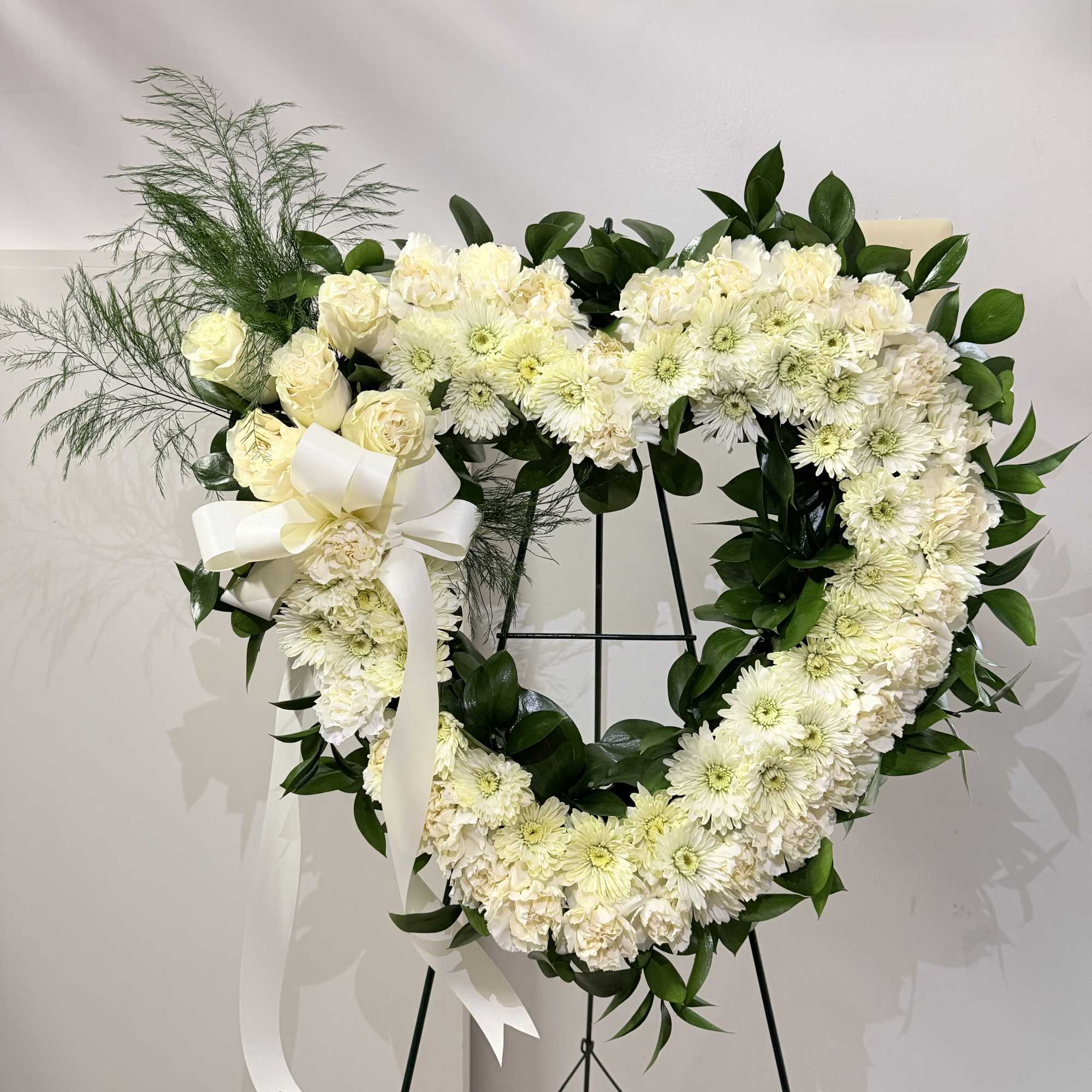 Cream, white and green heart shaped wreath. If you would like this