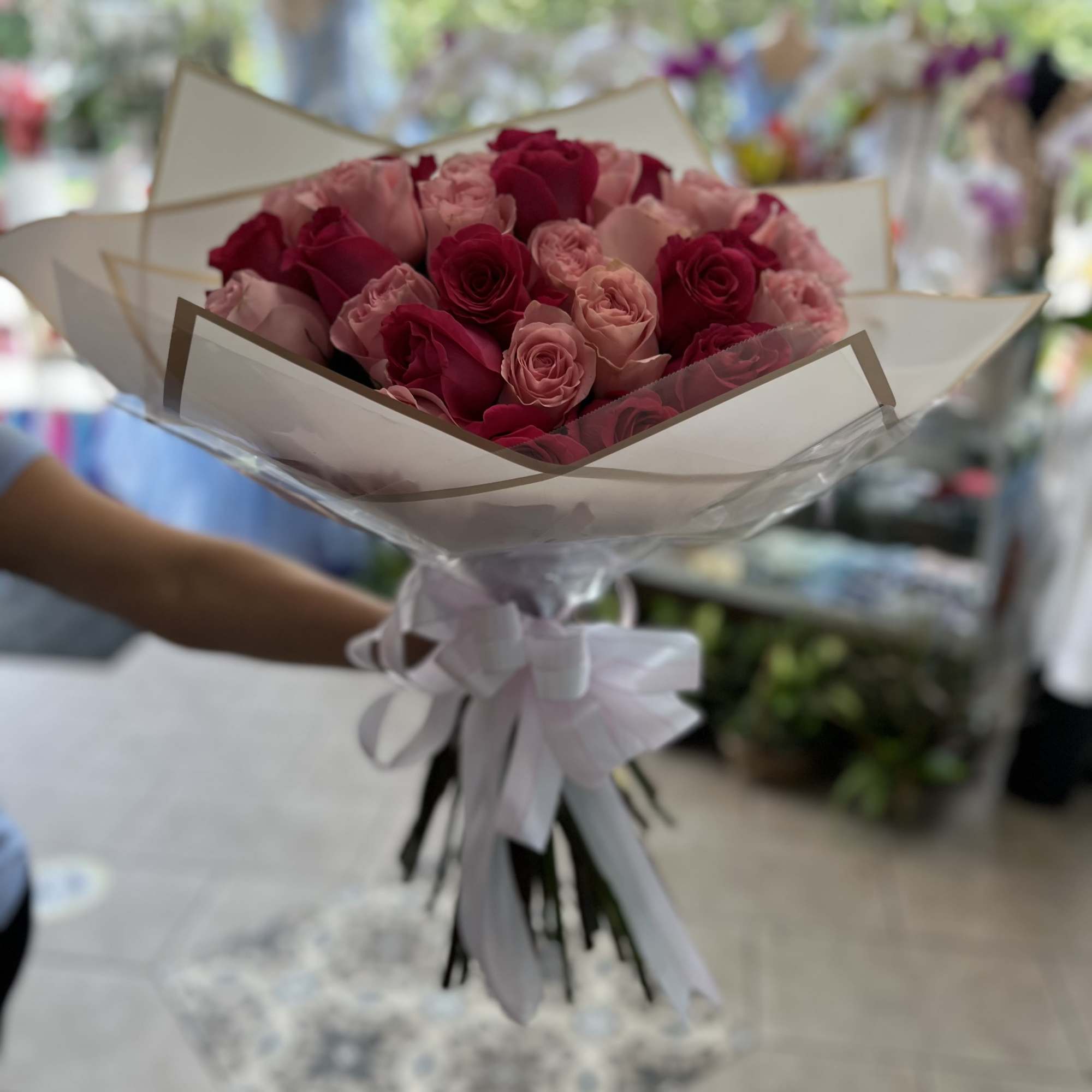 A perfect mixture of light pink and hot pink roses. For a, photo 2 of 2