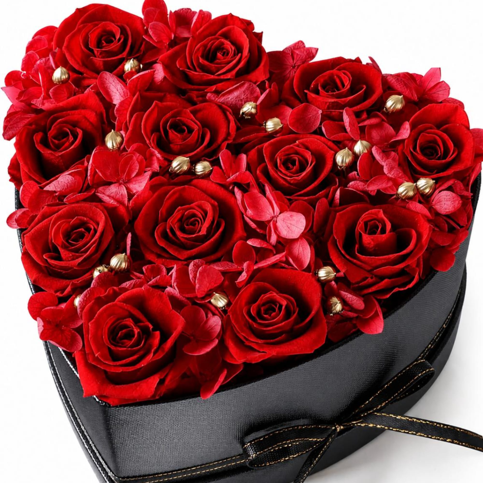 Heart-shaped box filled with red roses and red petals, photo 2 of 4