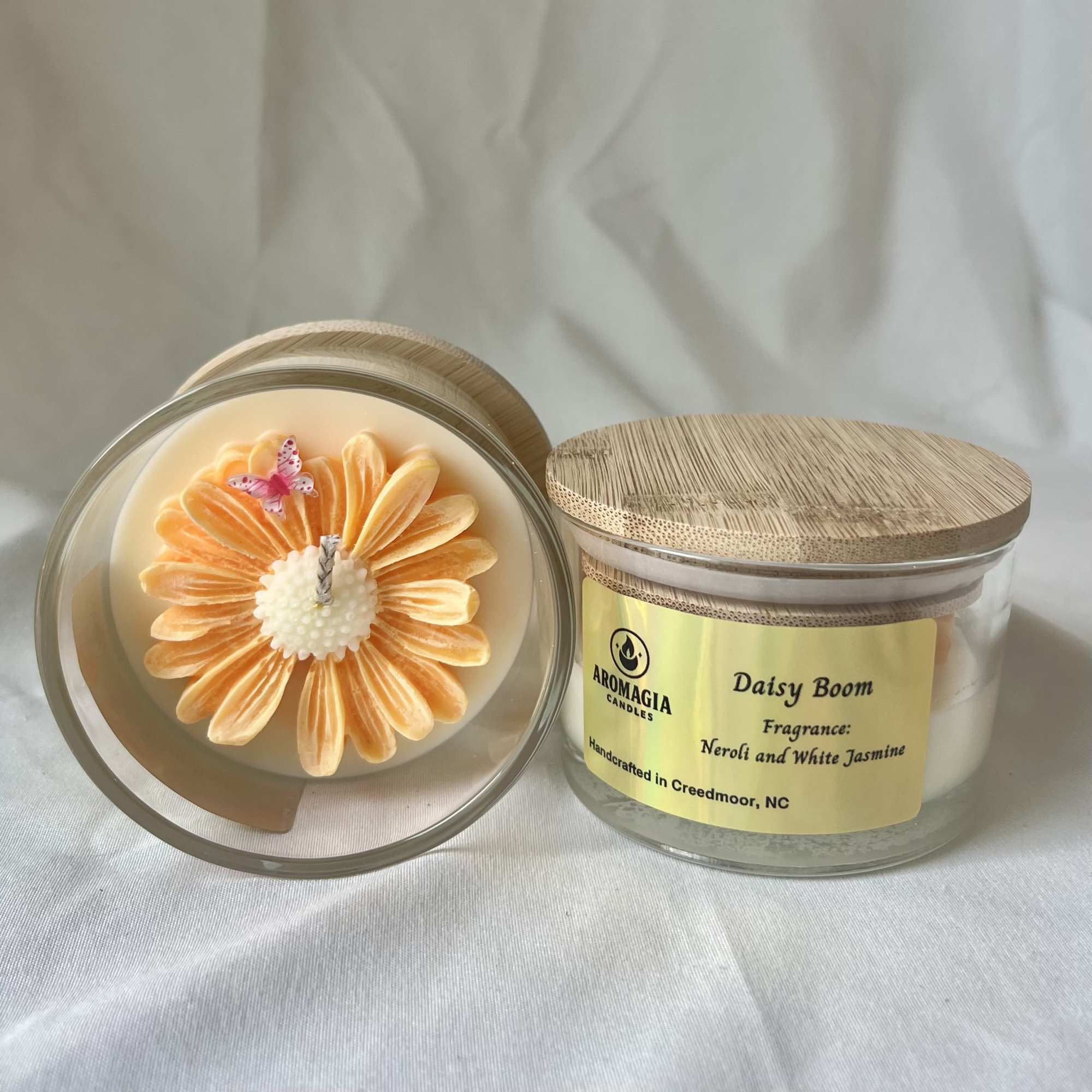 ONE Daisy Boom candle. Each color is uniquely scented. Please look at, photo 2 of 4