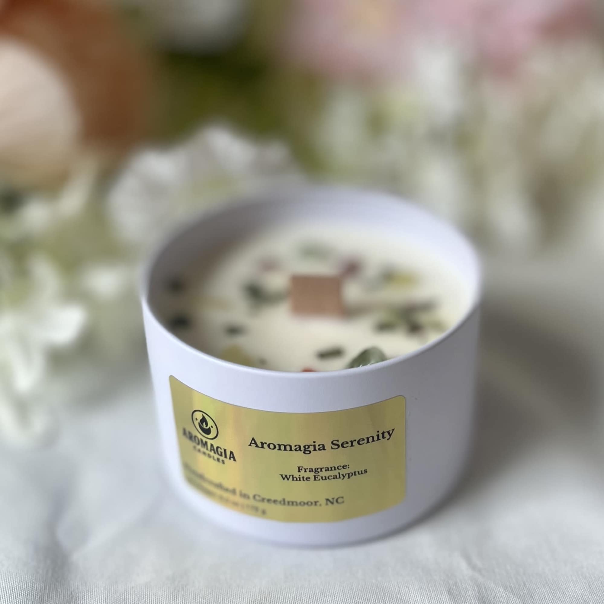 One woodwick candle scented as white eucalyptus. Choose between standard 3.3oz or