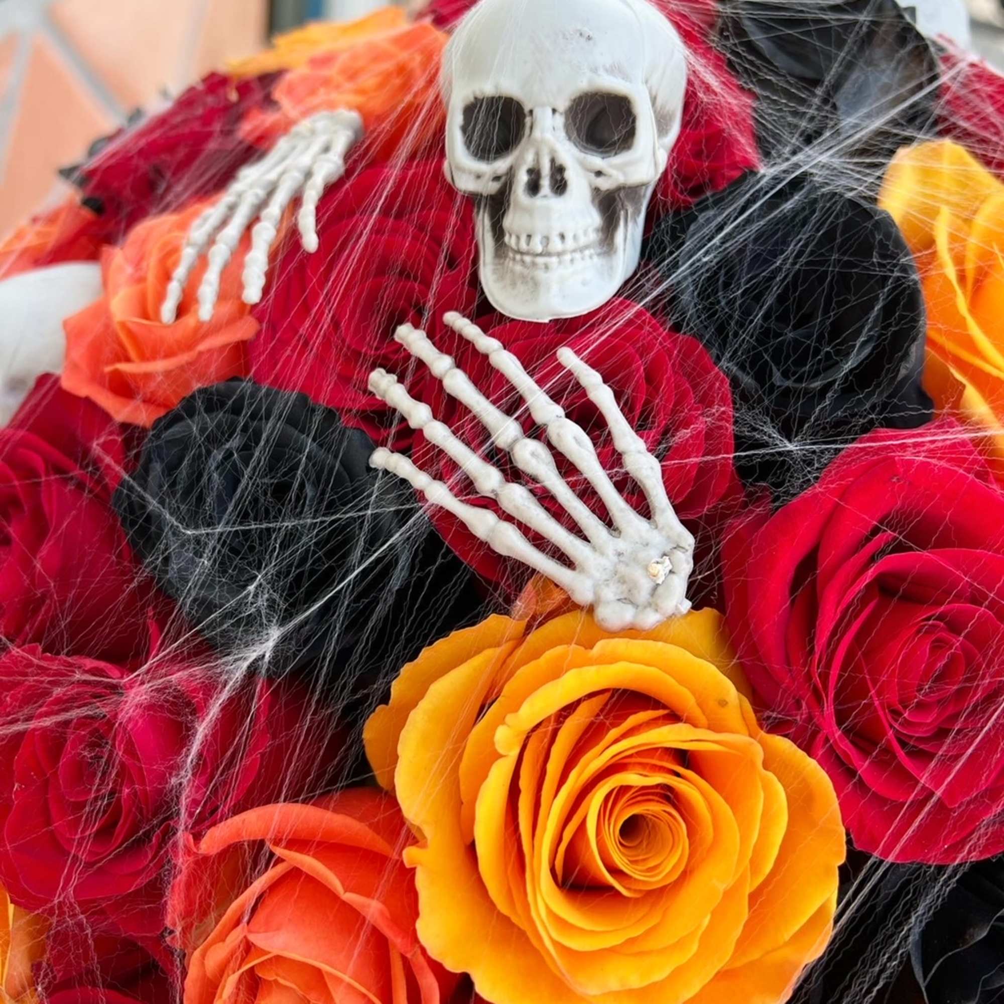 Dare to decorate with darkness. This hauntingly beautiful Halloween bouquet features black, photo 2 of 3