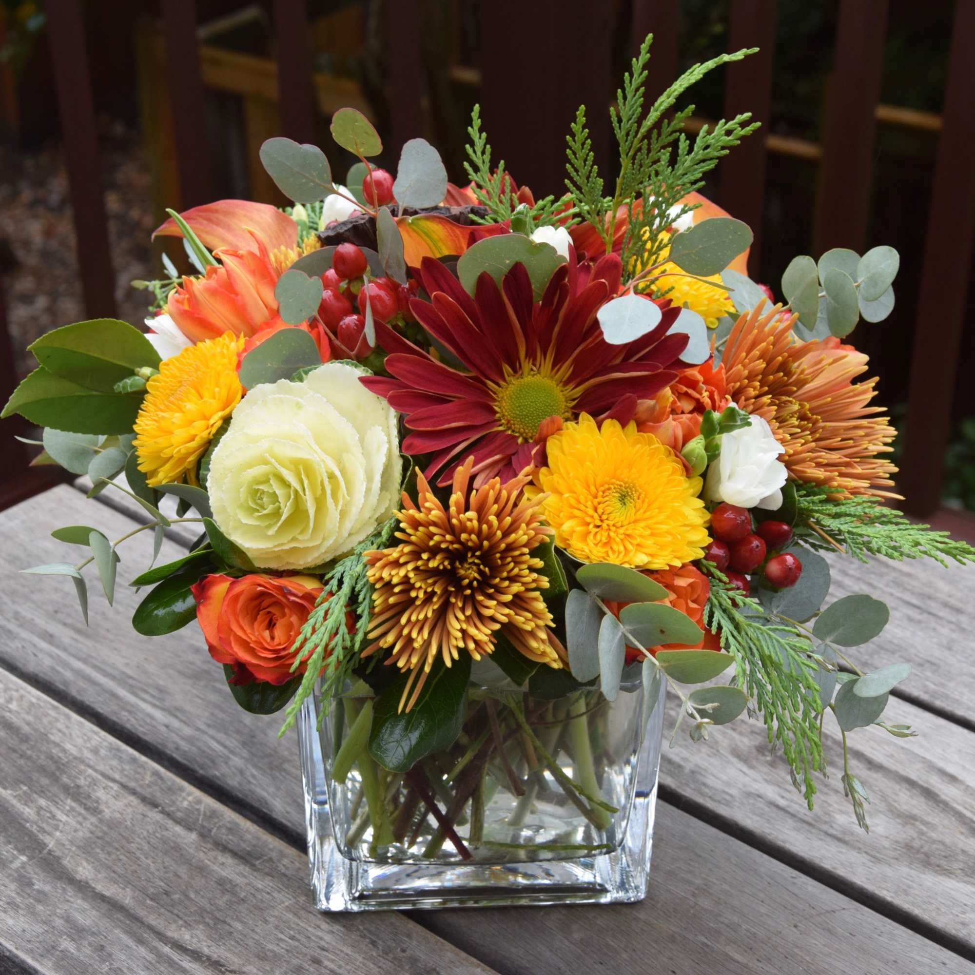 This arrangement is filled with all the bright wishes of the season.