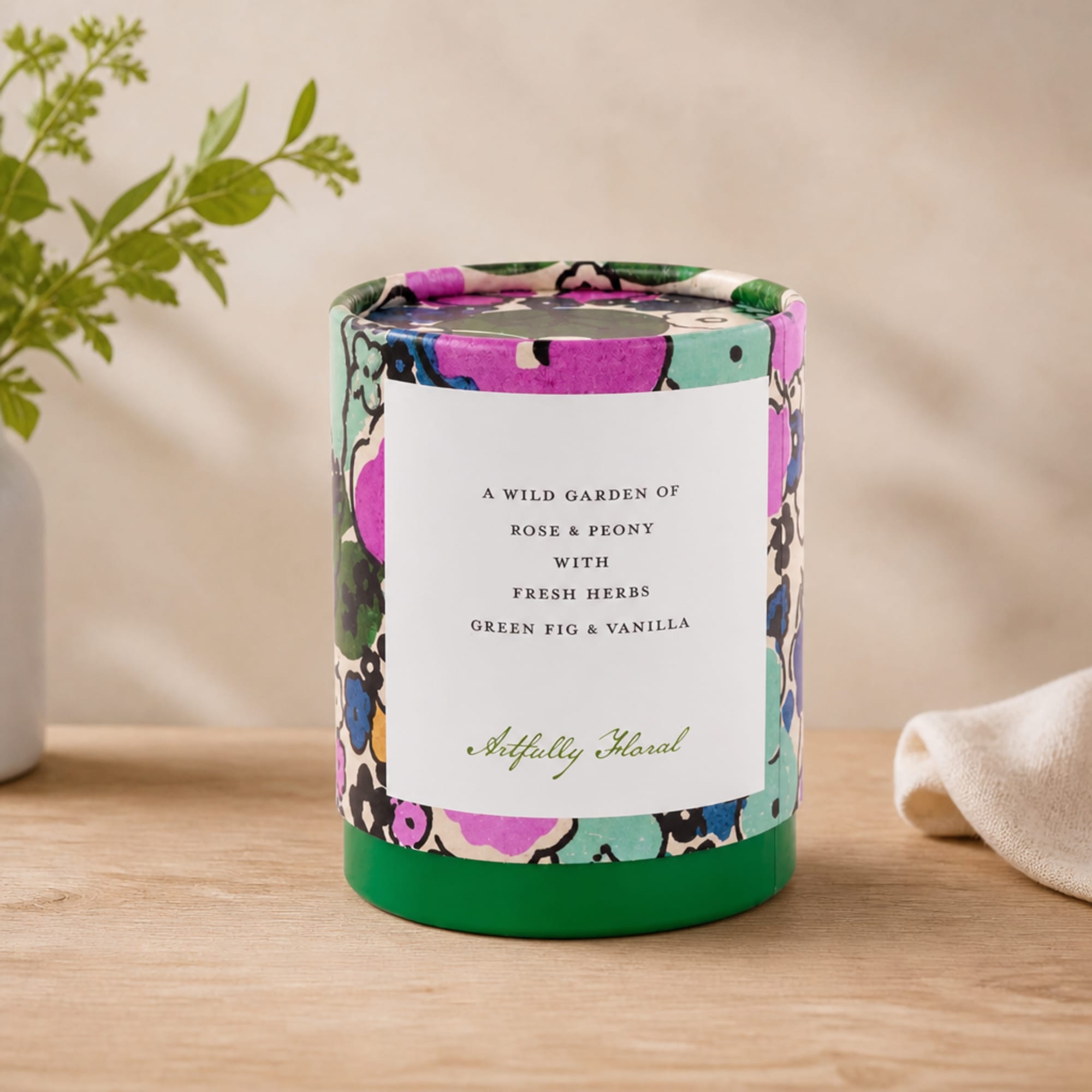 Floral-scented candle in a colorful patterned container, photo 2 of 2