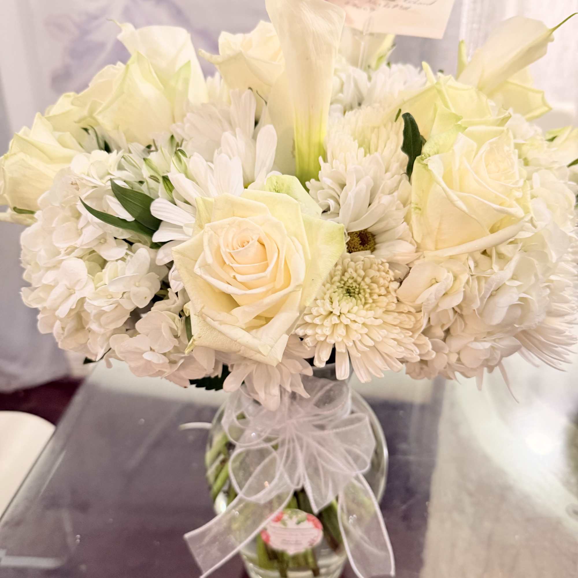 This arrangement is perfect for sympathy, weddings, anniversary, new beginnings, housewarming, or, photo 2 of 2