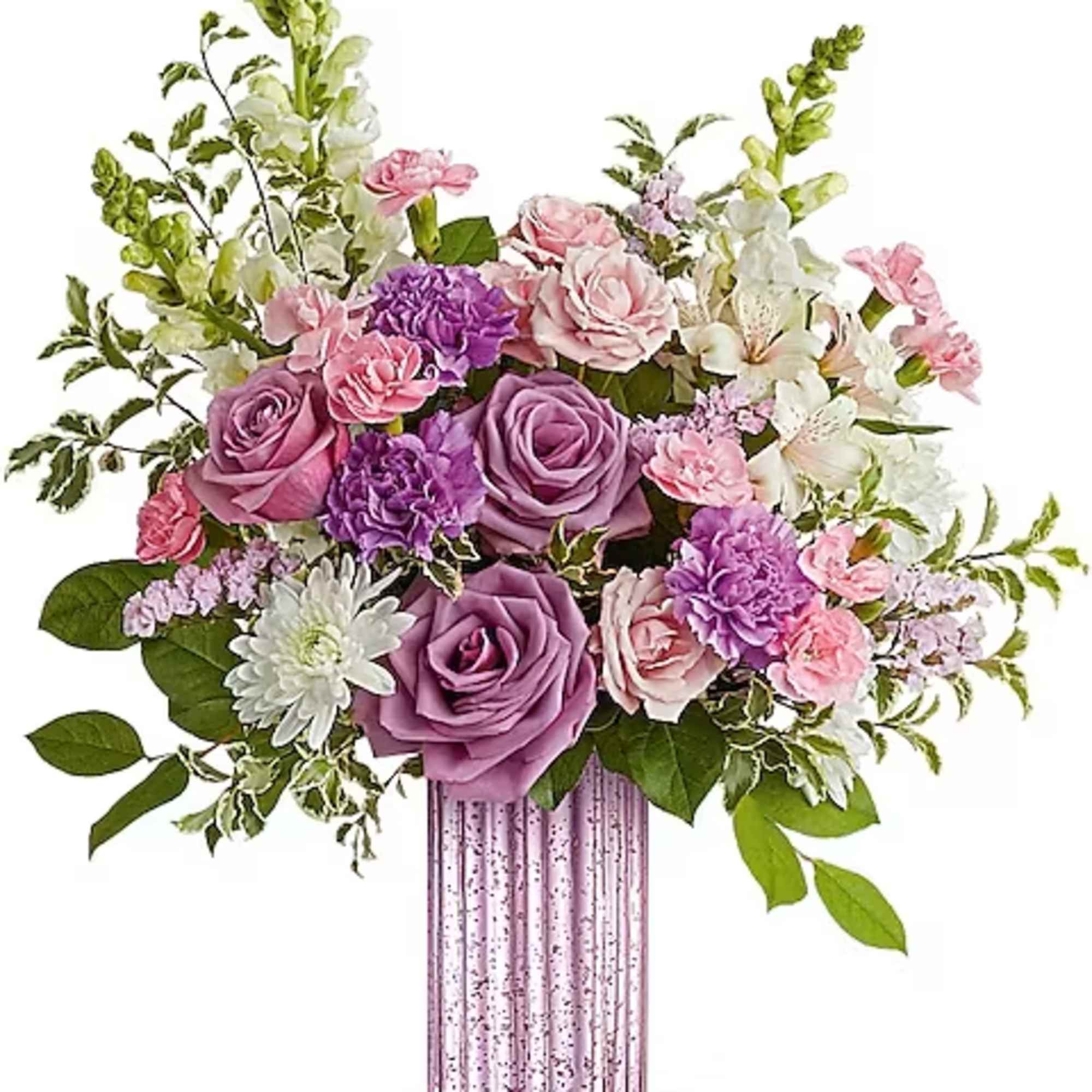 Bouquet of pink and purple flowers in a pink glass vase