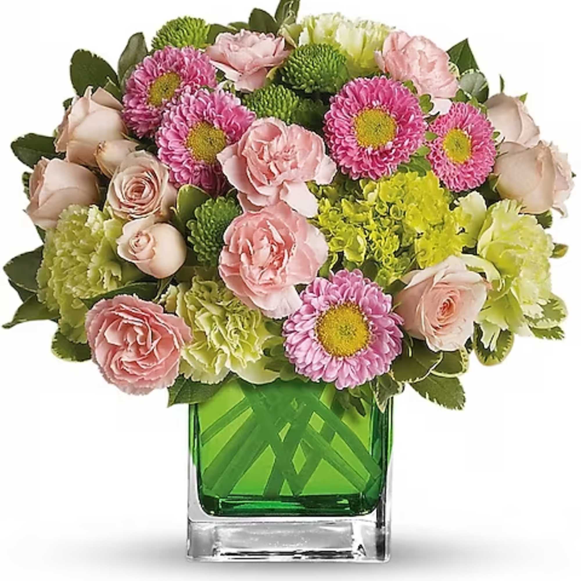 Pink and green mixed bouquet in a square glass vase