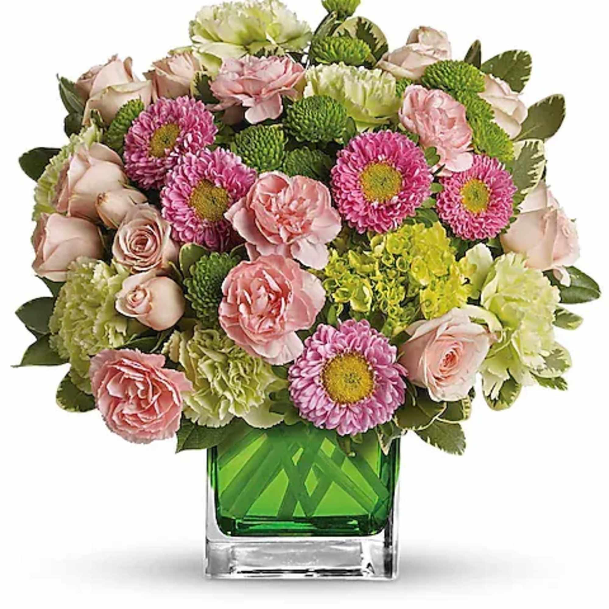 Pink and green mixed bouquet in a square glass vase