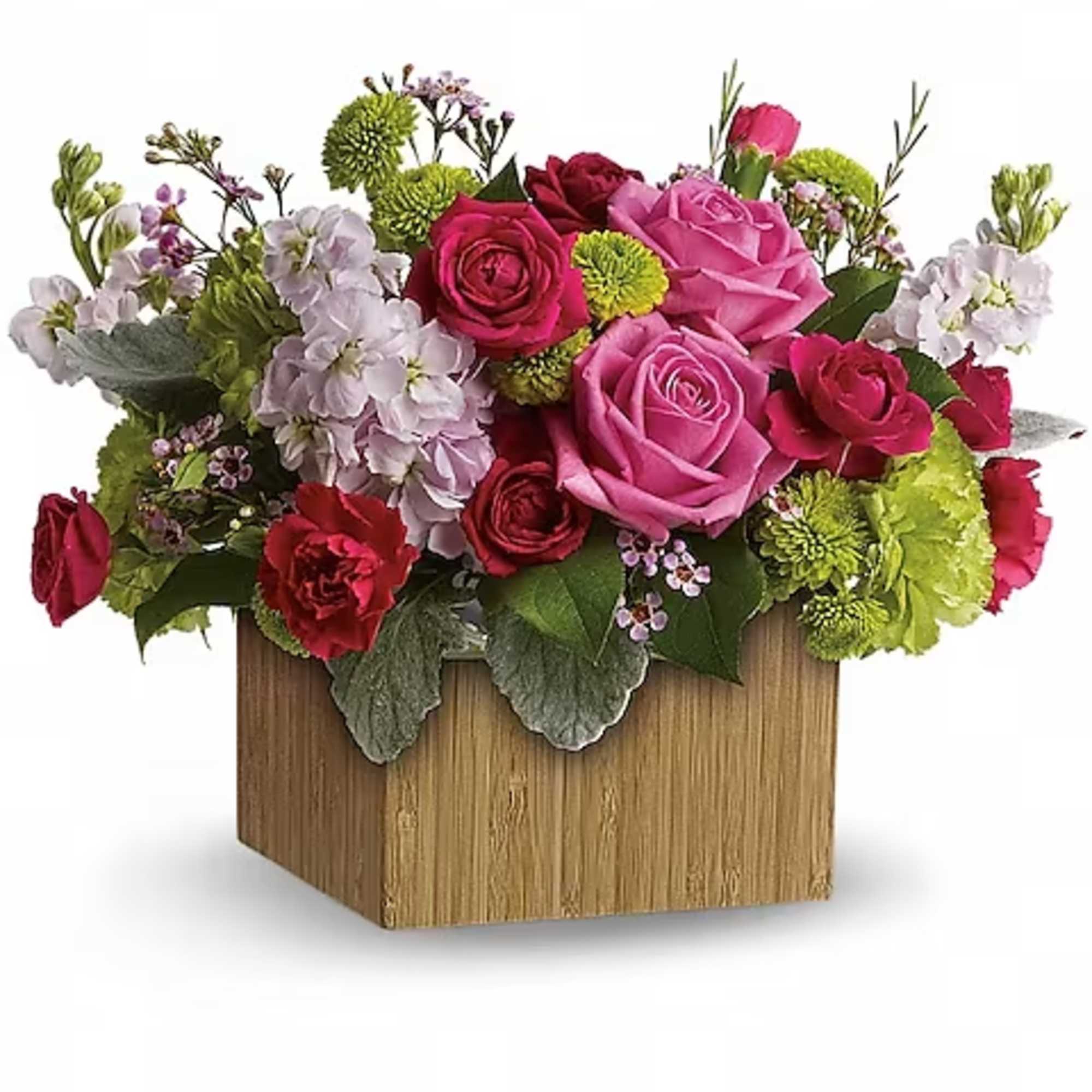 Pink and red rose arrangement in a wooden box