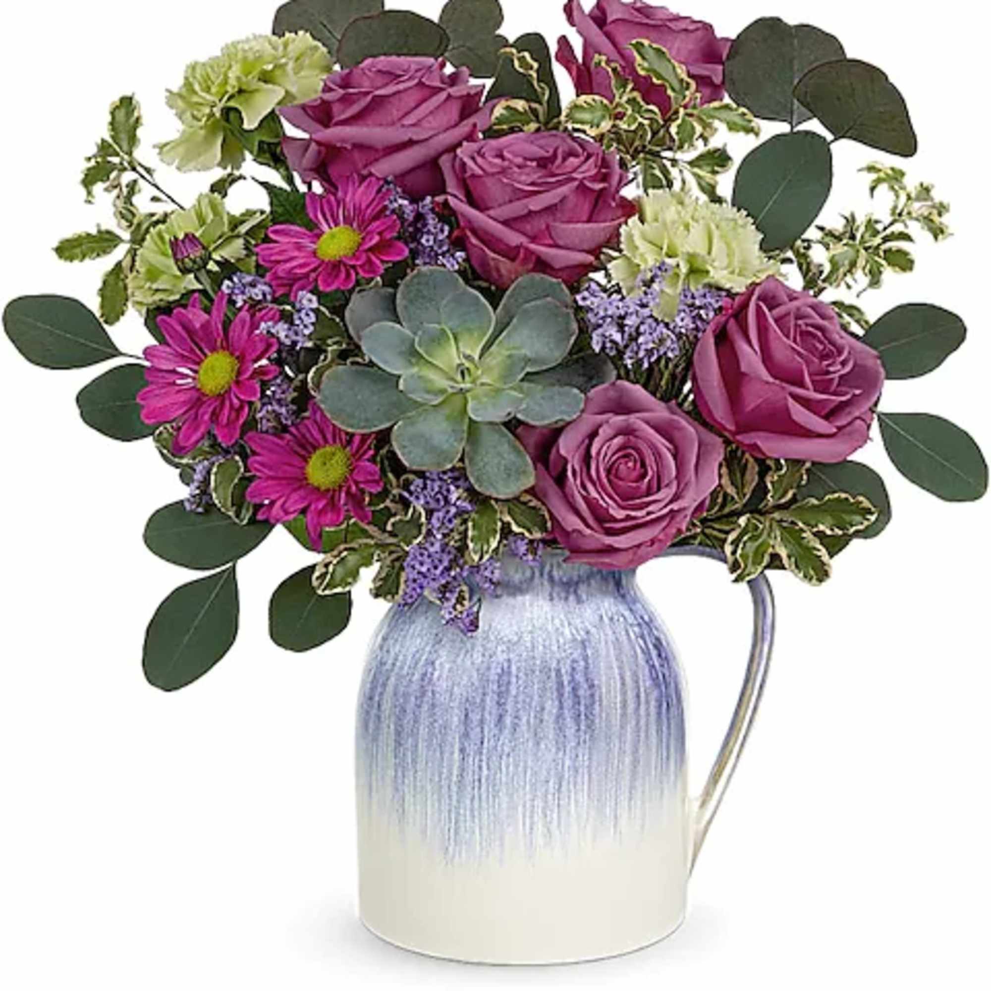 Purple roses and pink daisies in a blue-and-white pitcher vase