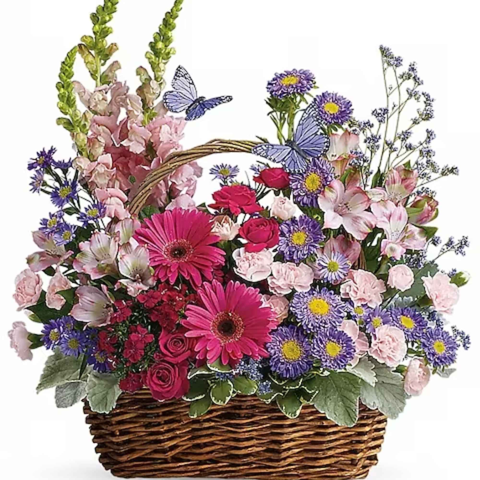 Basket arrangement of pink and purple flowers with butterfly accents