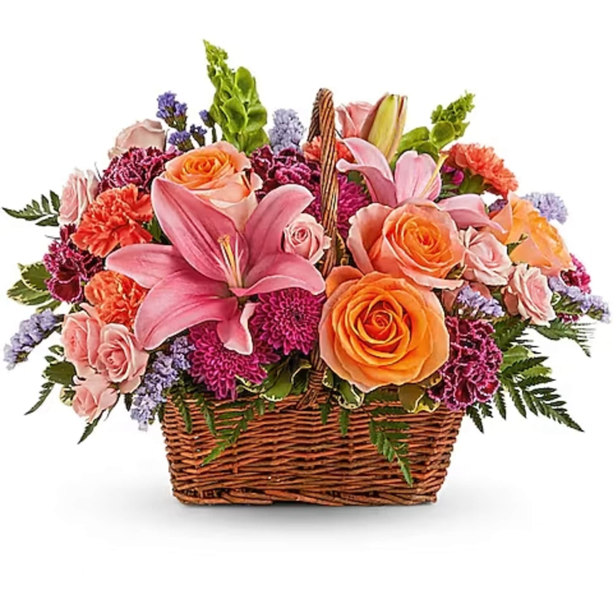 Basket arrangement of pink lilies, roses, and purple flowers